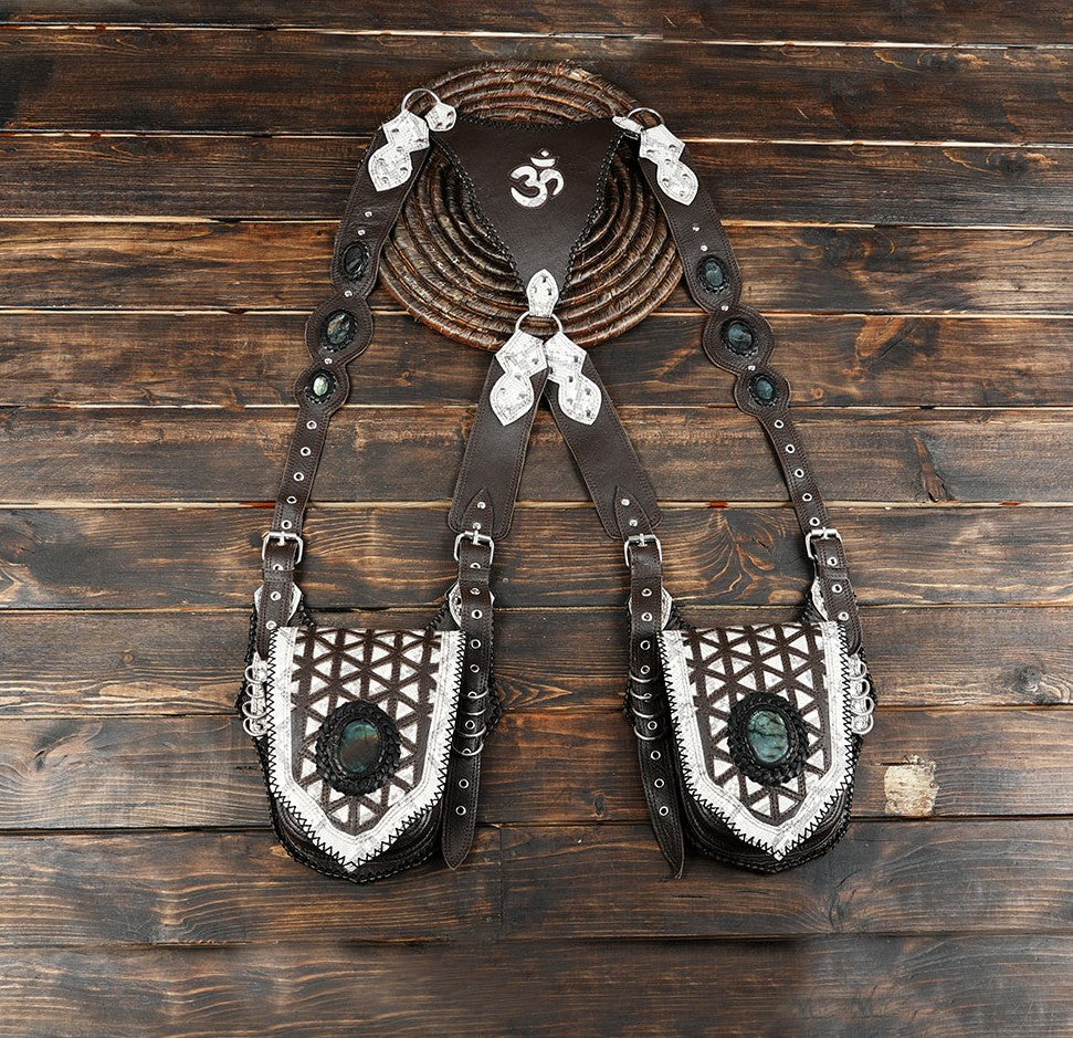 Artisan leather holster bag featuring black and white embossed geometric patterns