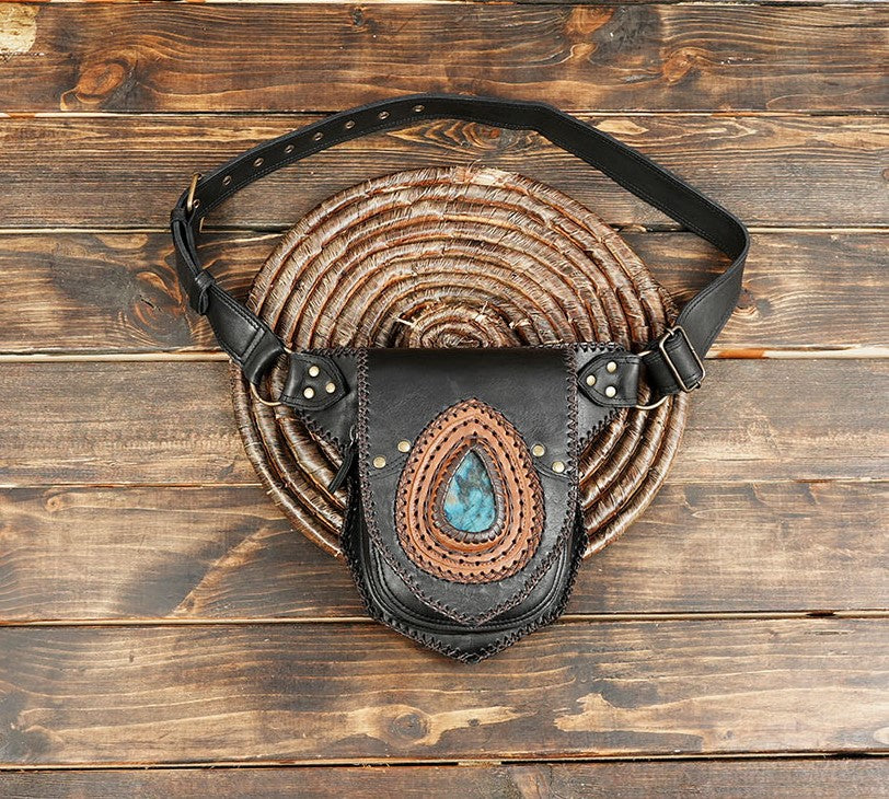 Handcrafted black and brown leather belt bag with blue gemstone centerpiece