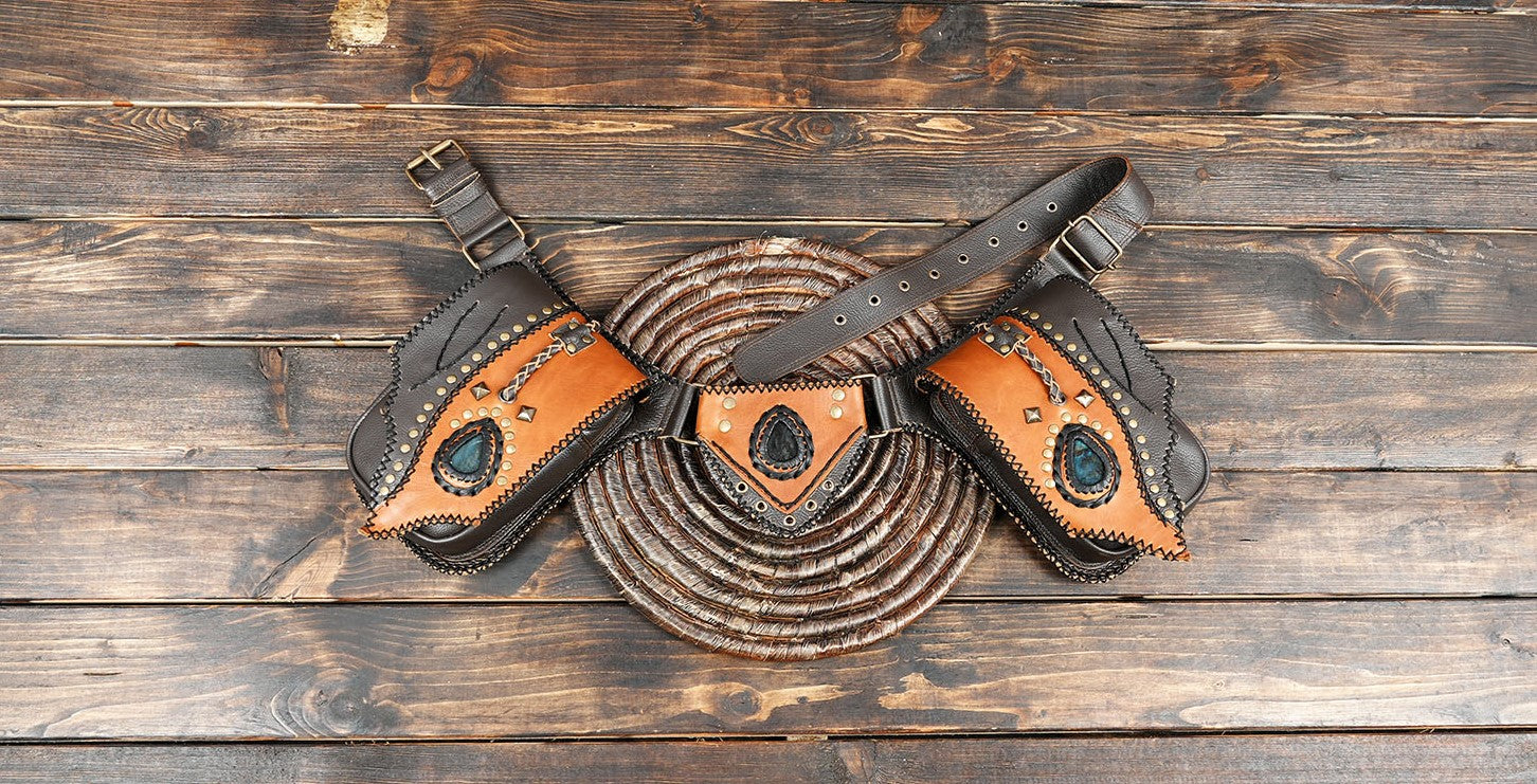 Handmade brown and tan leather holster belt with gemstone design