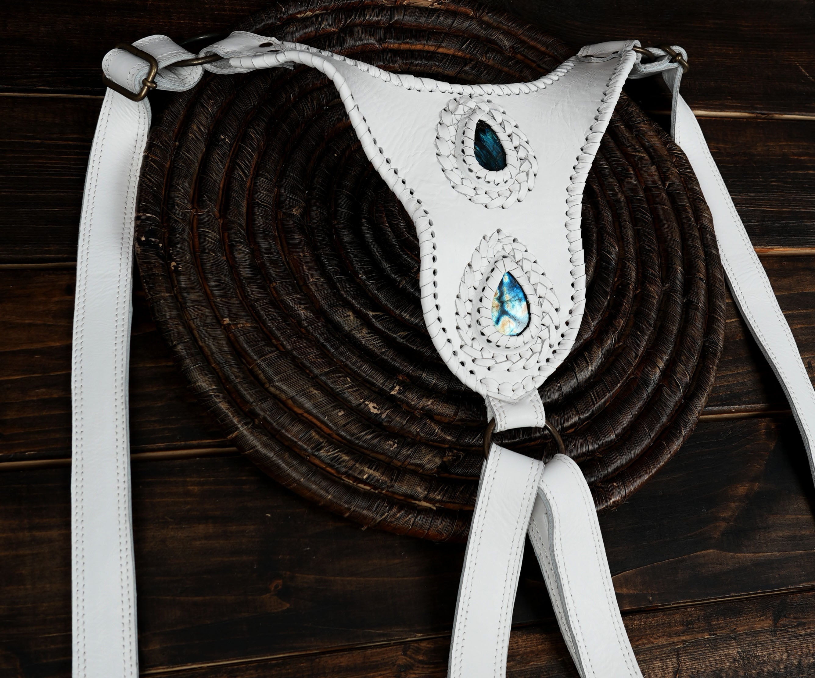 Artisan-crafted white leather utility belt with twin pockets and blue stones.