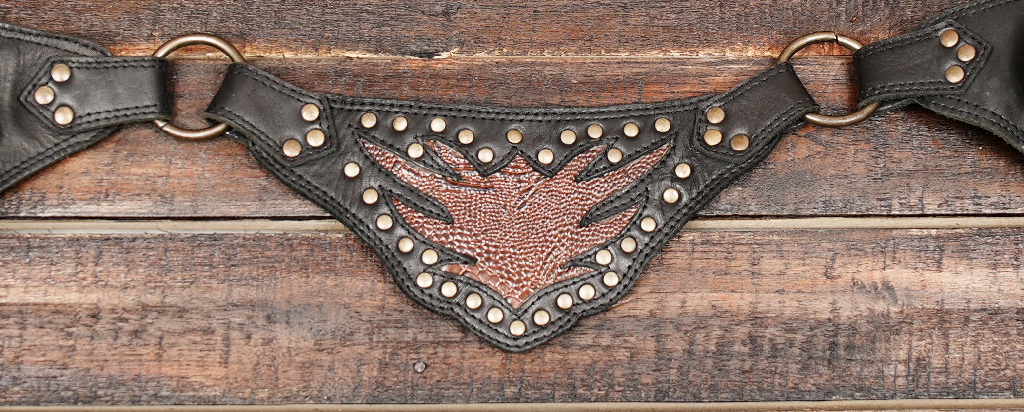 This Handmade Leather Waist Belt is a one-of-a-kind accessory that combines art, function,
