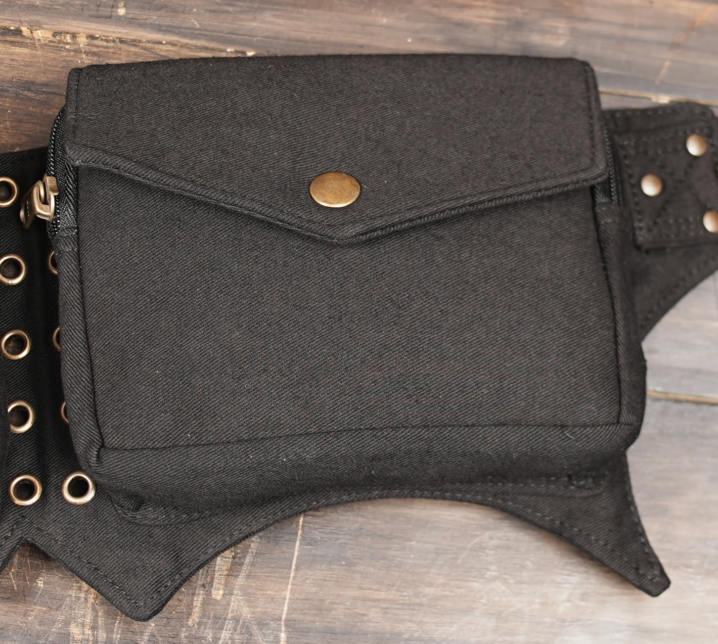 Festival-ready black canvas waist pouch with storage