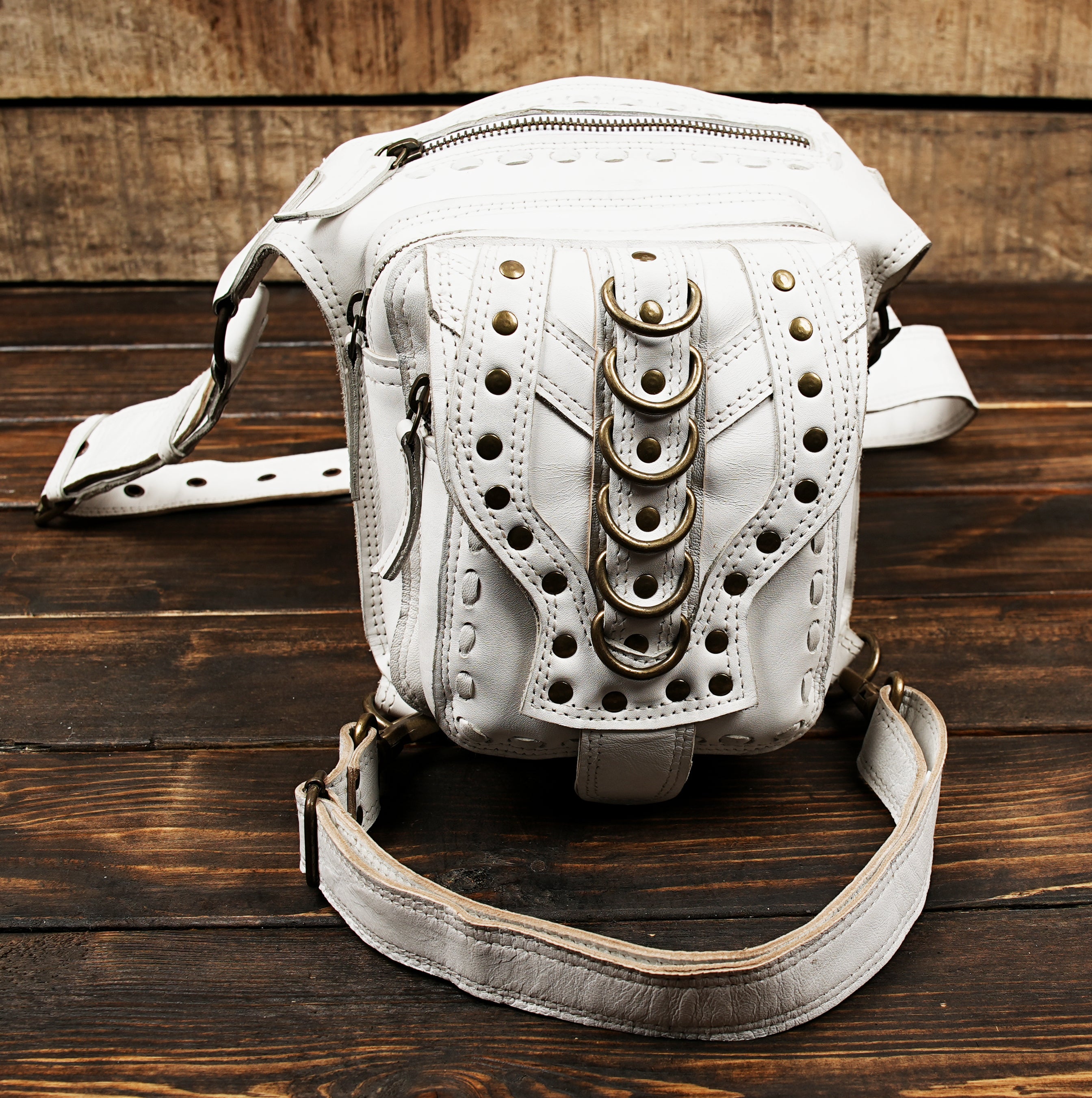 White leather festival belt pouch with gothic rivet details