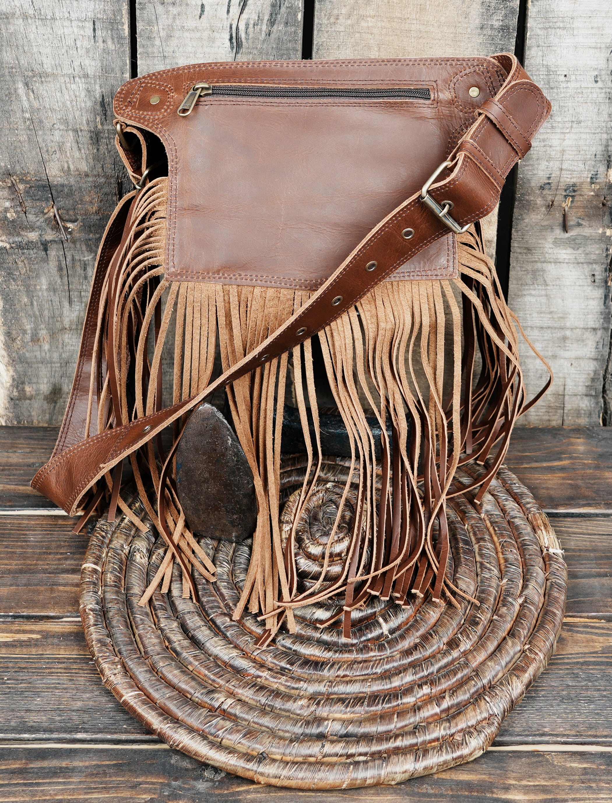 Bohemian craft leather waist pouch with tassel fringe edges