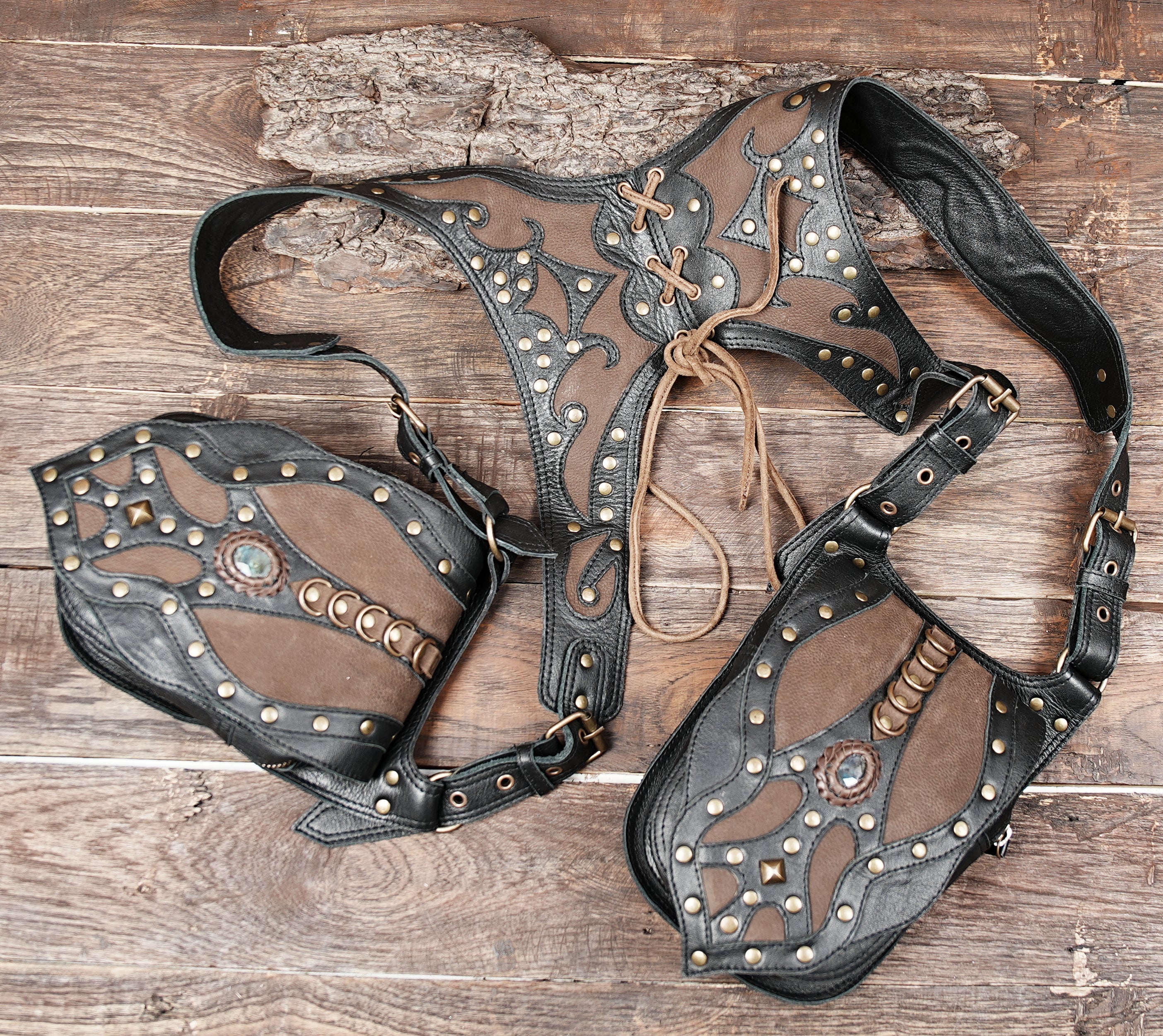 front flap detail of brown inlay and gemstone on harness holster bag