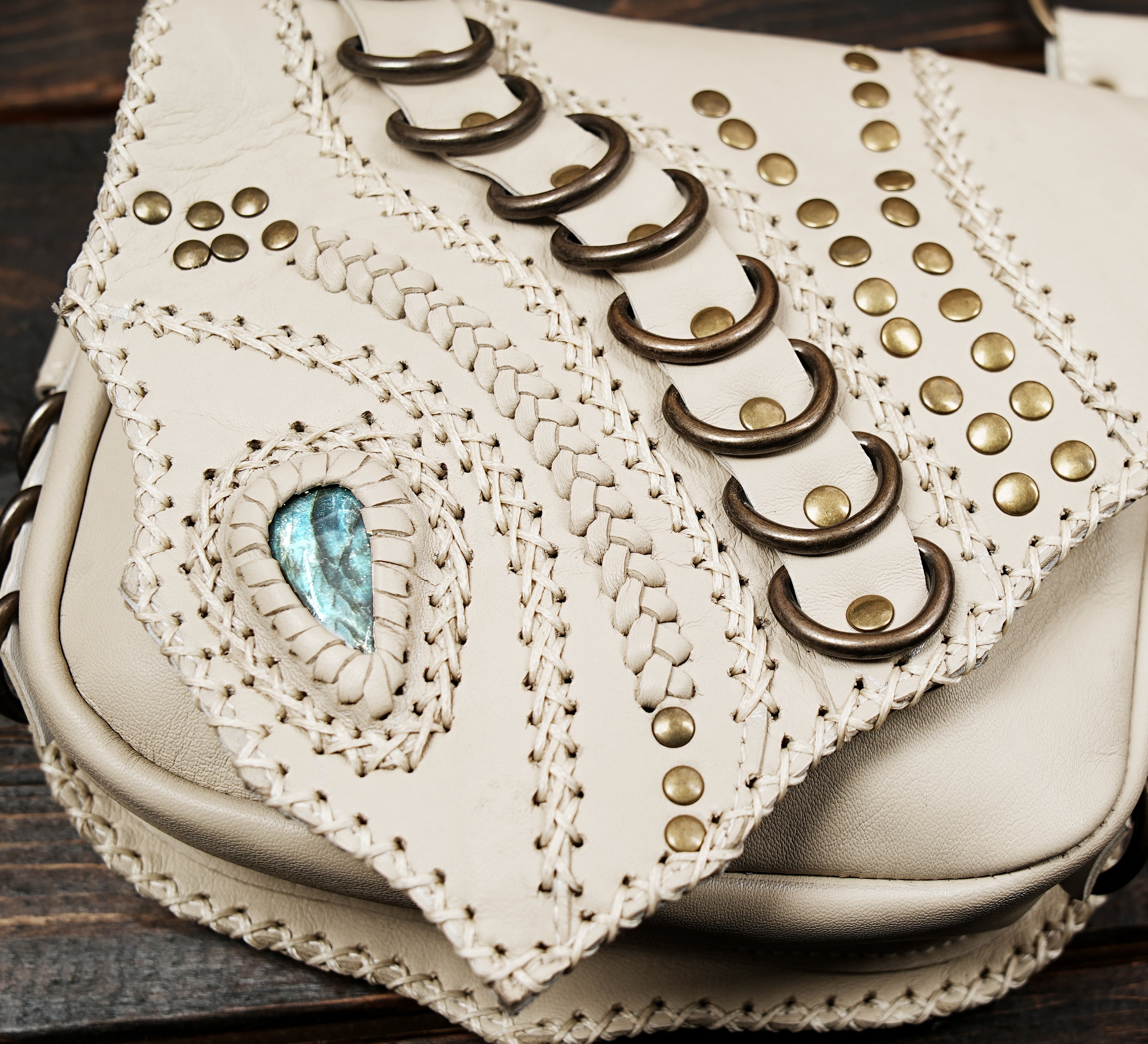 Steampunk inspired white leather utility harness with gemstone design