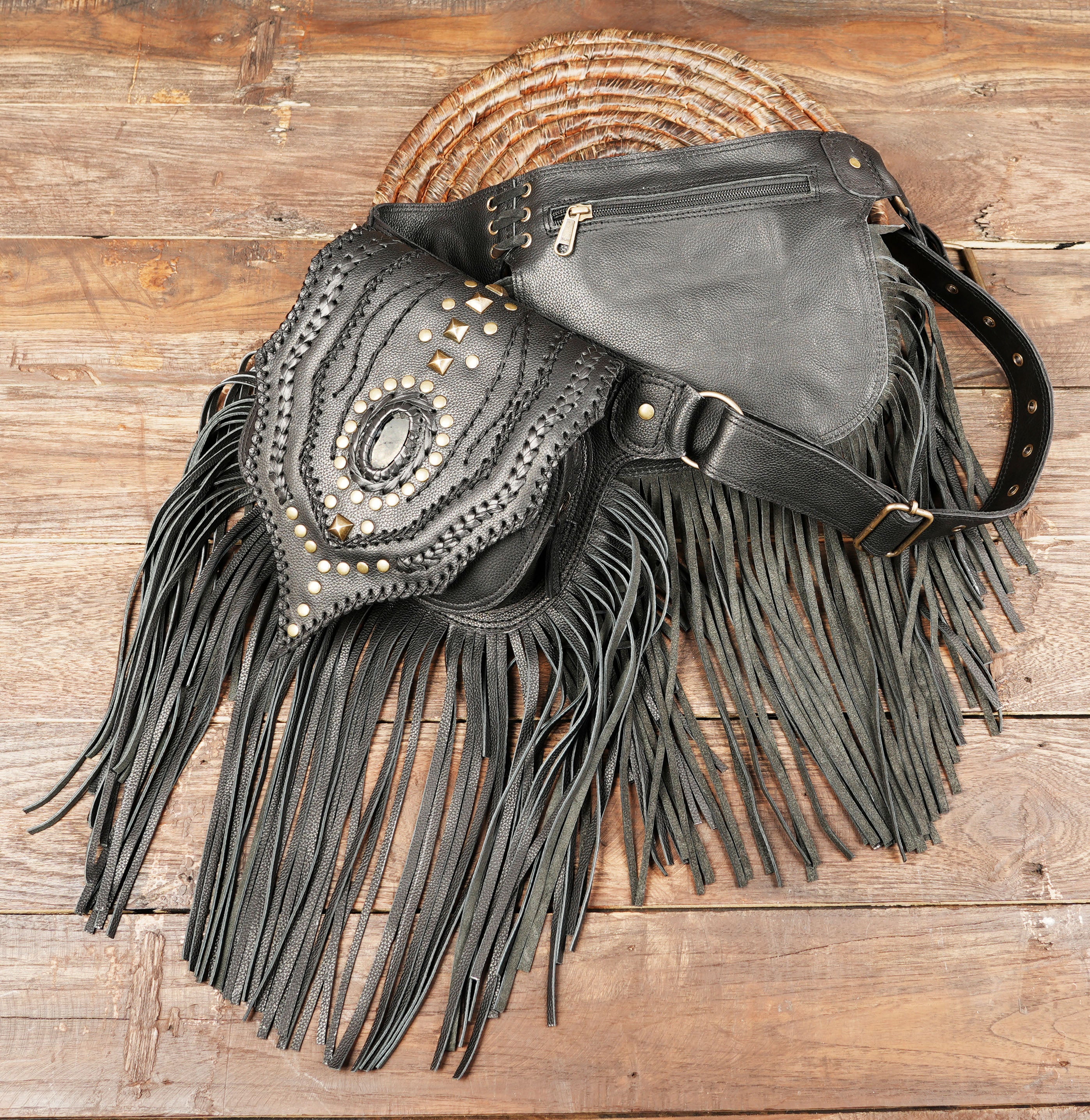 Black leather hip pouch with gemstone and fringe design