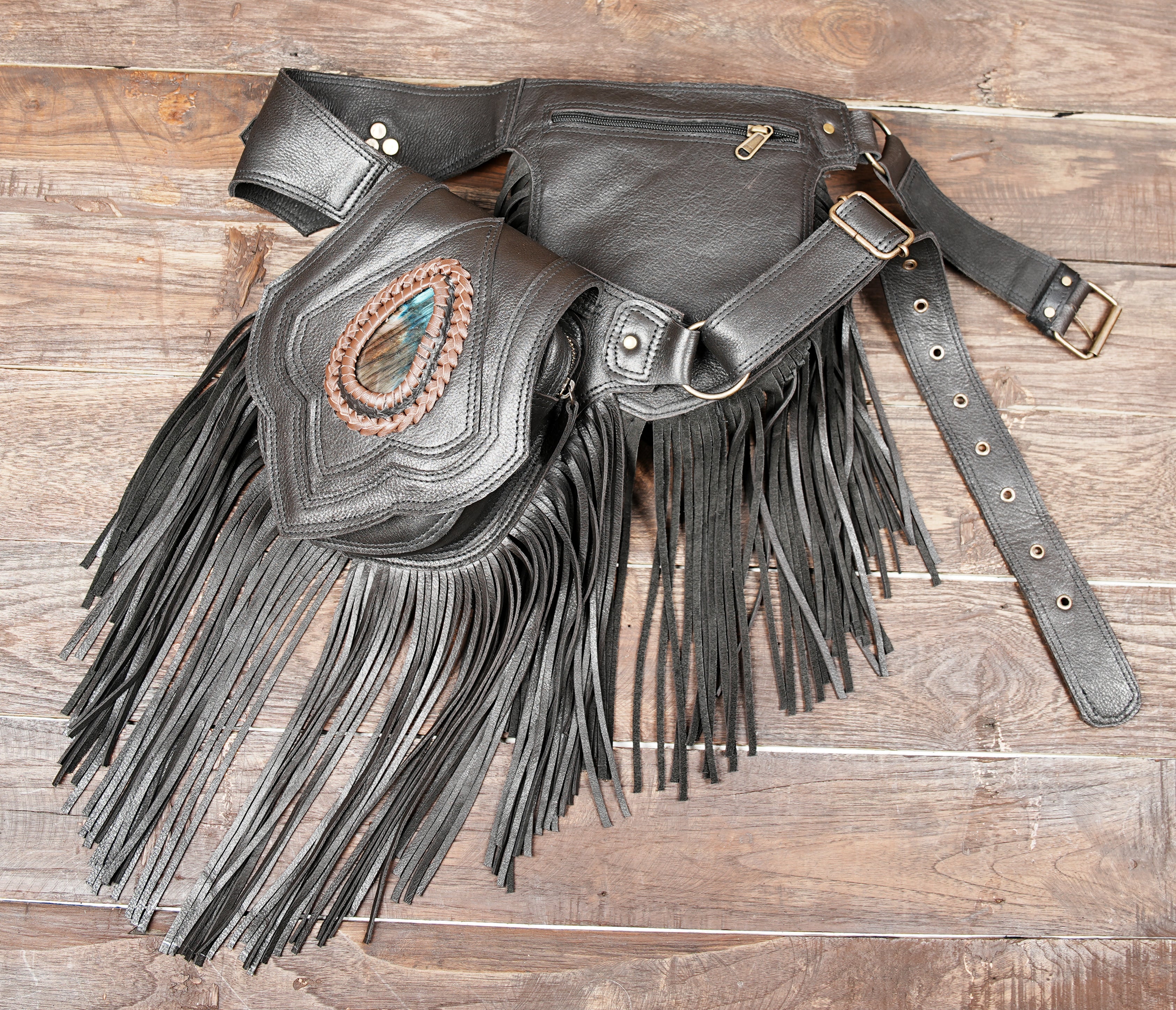 Large pouch belt with leather fringe fanny pack.
