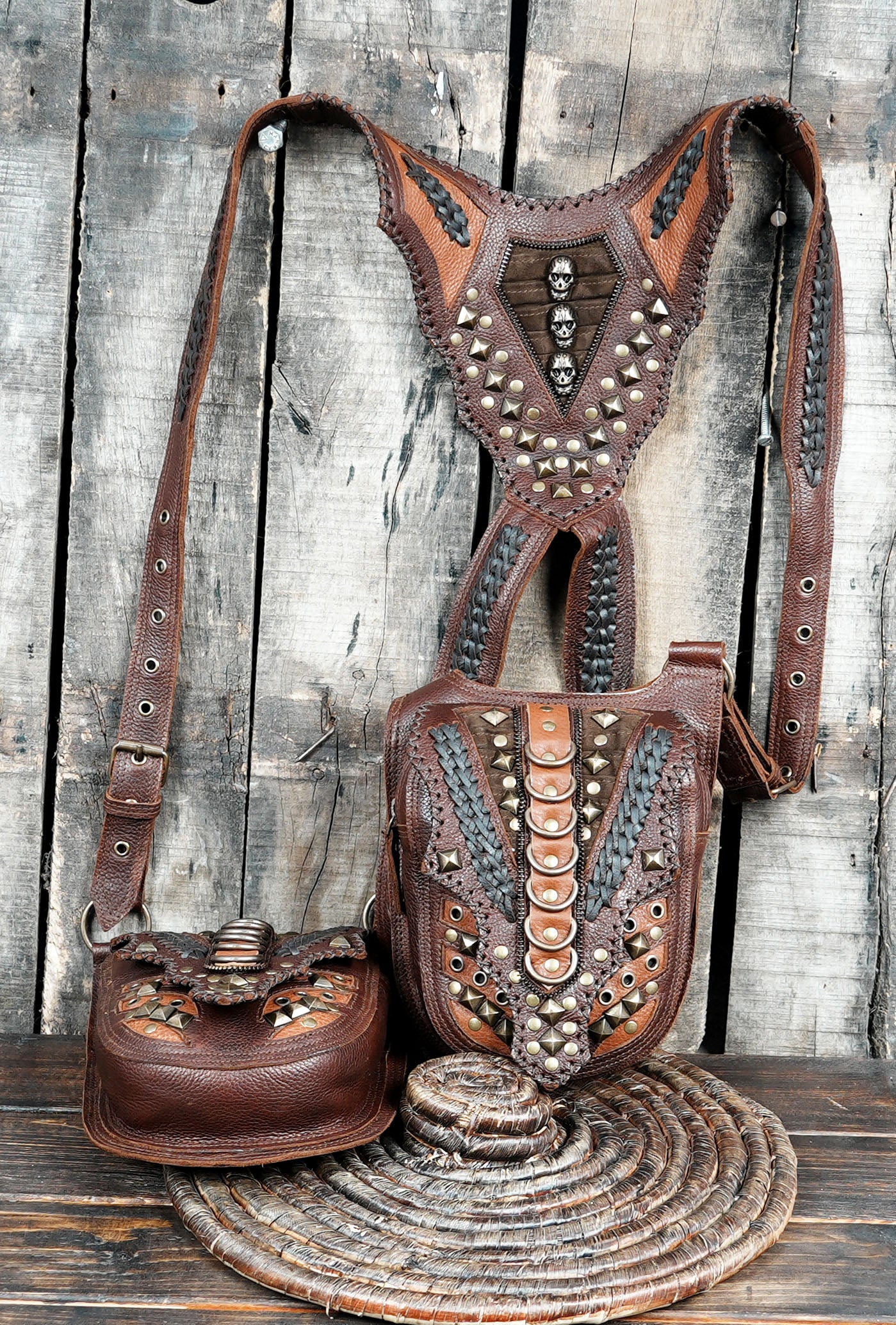 “Two-pocket leather shoulder holster for hands-free carrying”