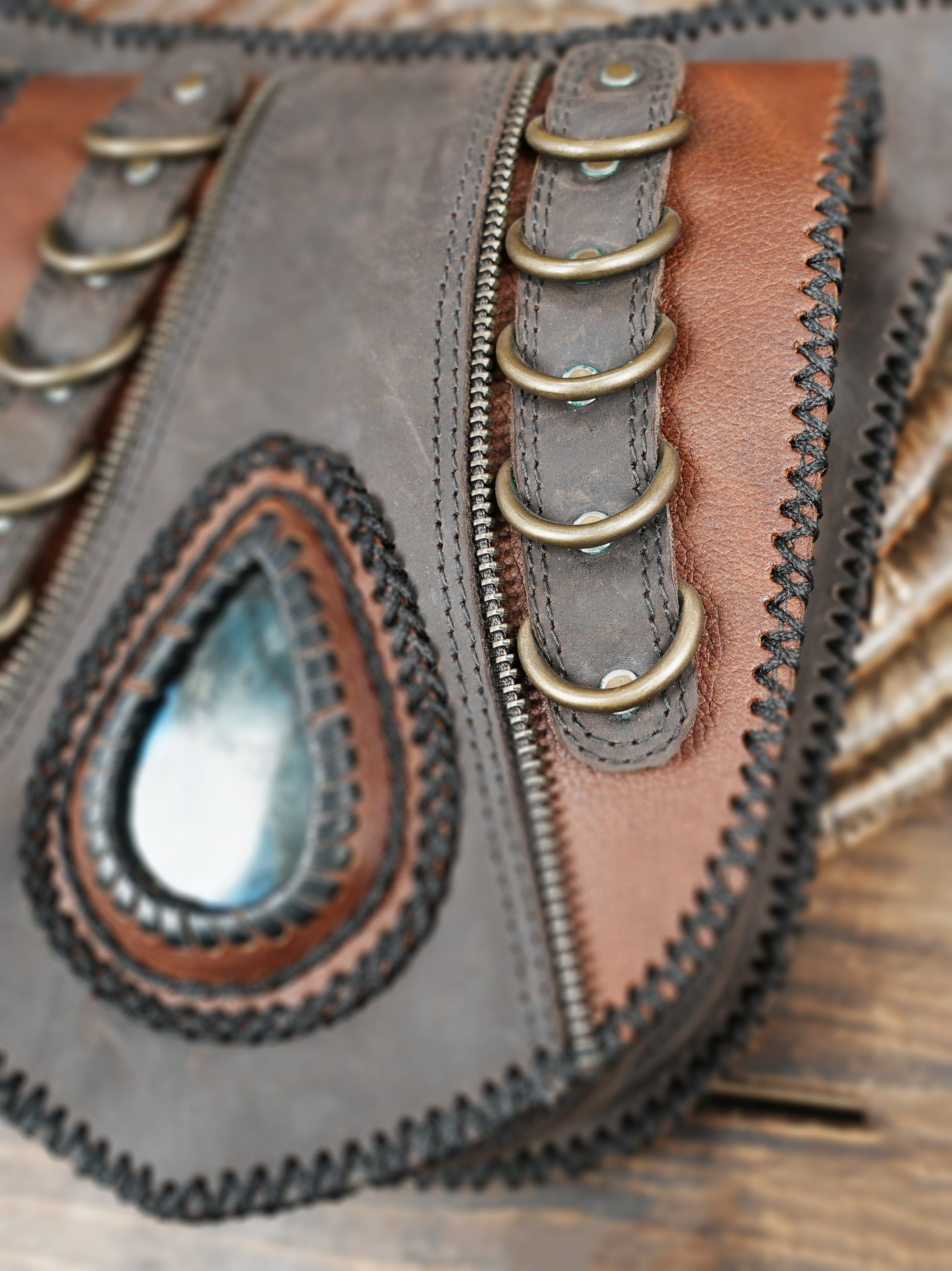 Steampunk themed leather hip pouch with gemstone inlay and straps
