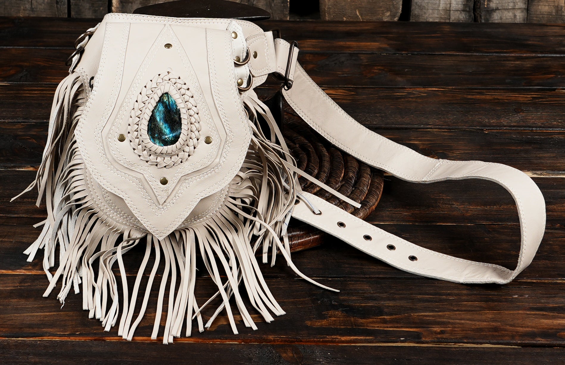 White leather waist bag styled for festivals and concerts