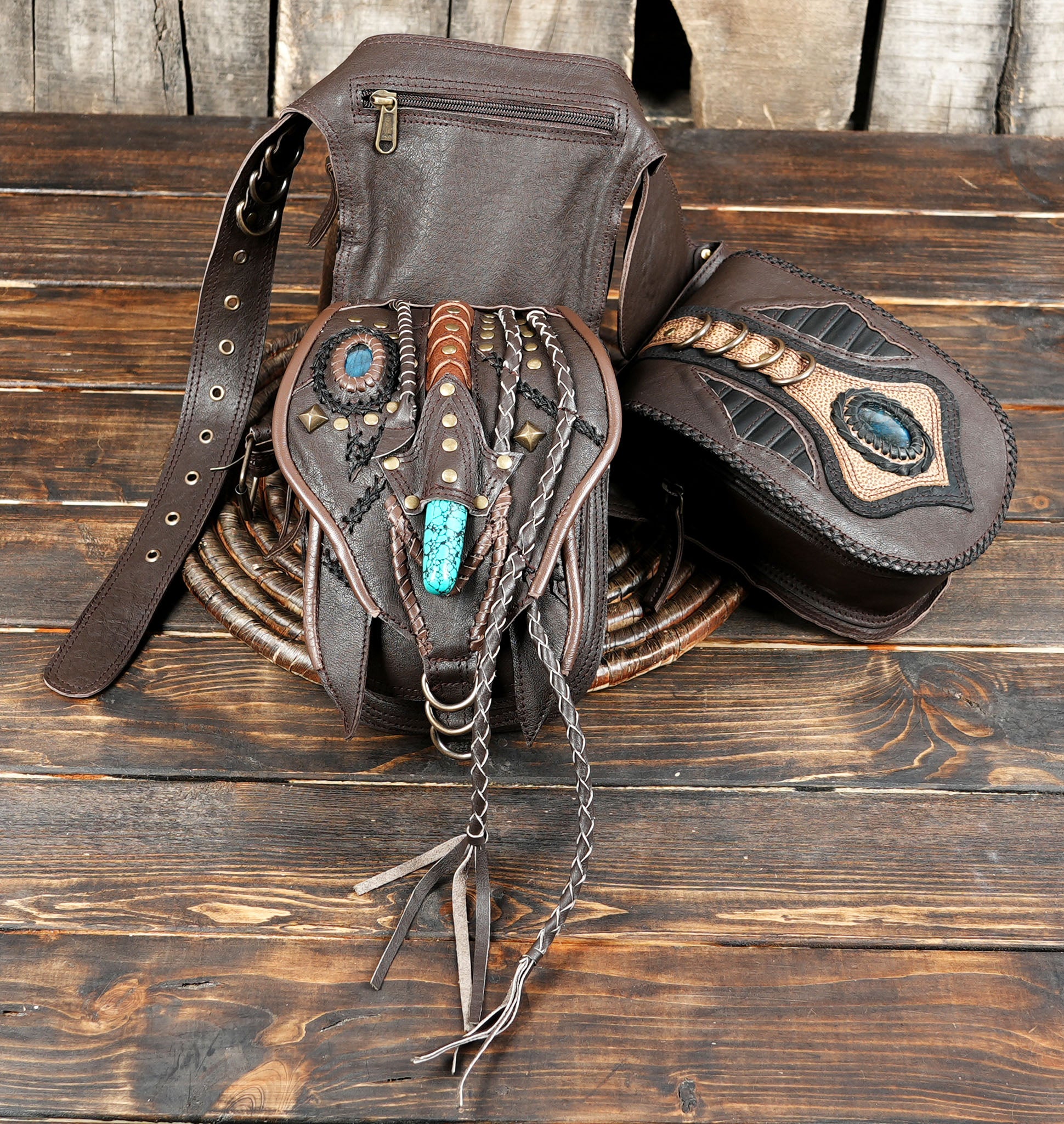 Close-up shot of gemstone and leather braid detailing on brown hip bag