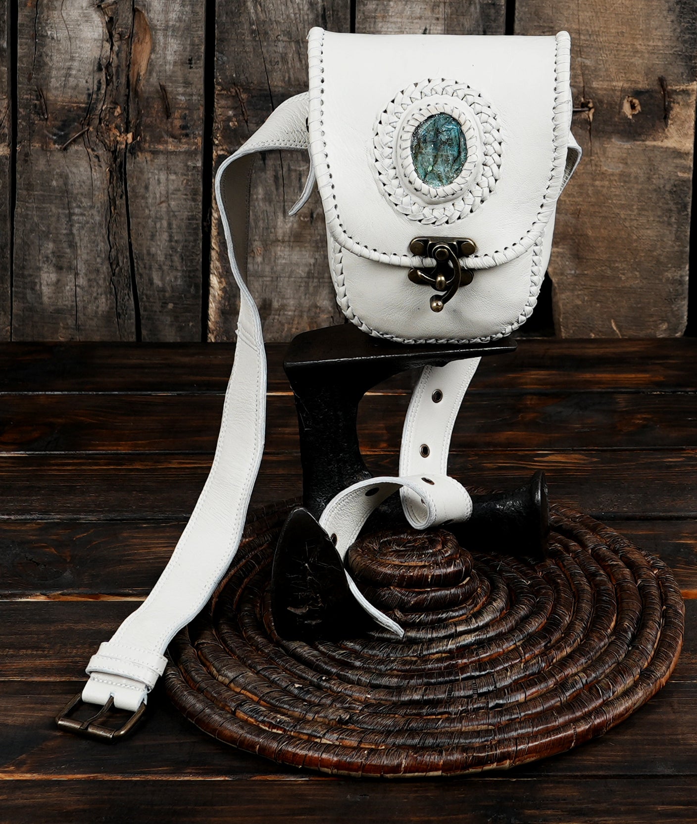 Handmade gemstone leather waist pouch for festivals or travel.