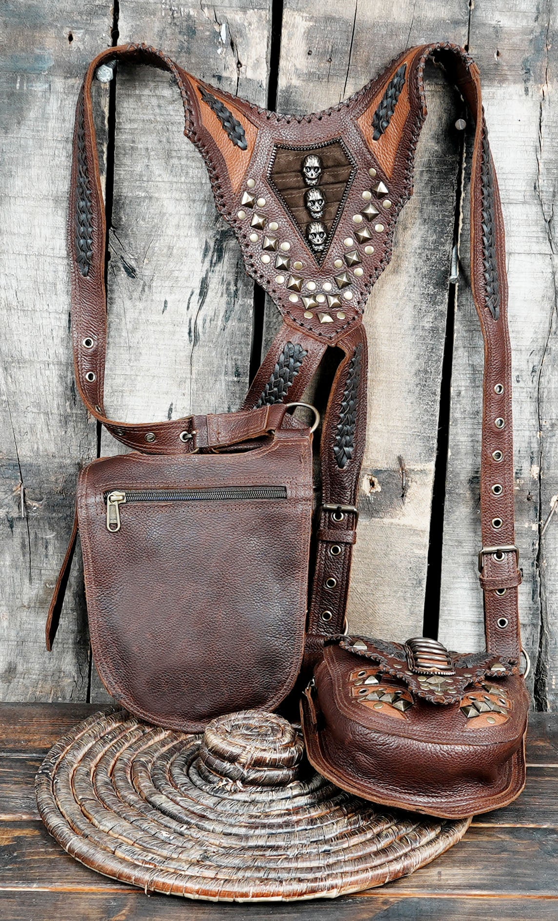 “Brown leather utility holster with adjustable straps and embossed details”