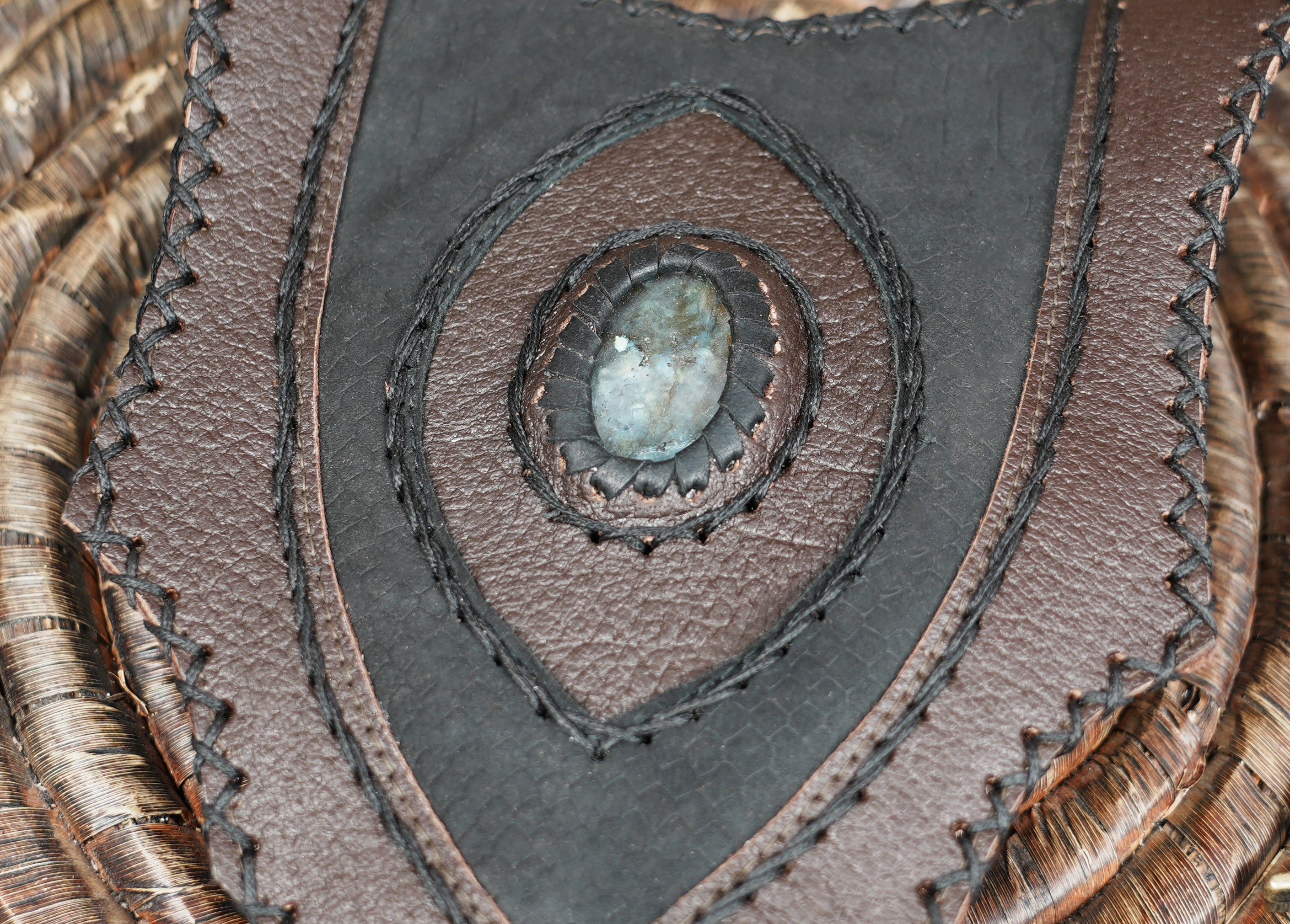 Dark leather utility harness with gemstone inlay and metal rings