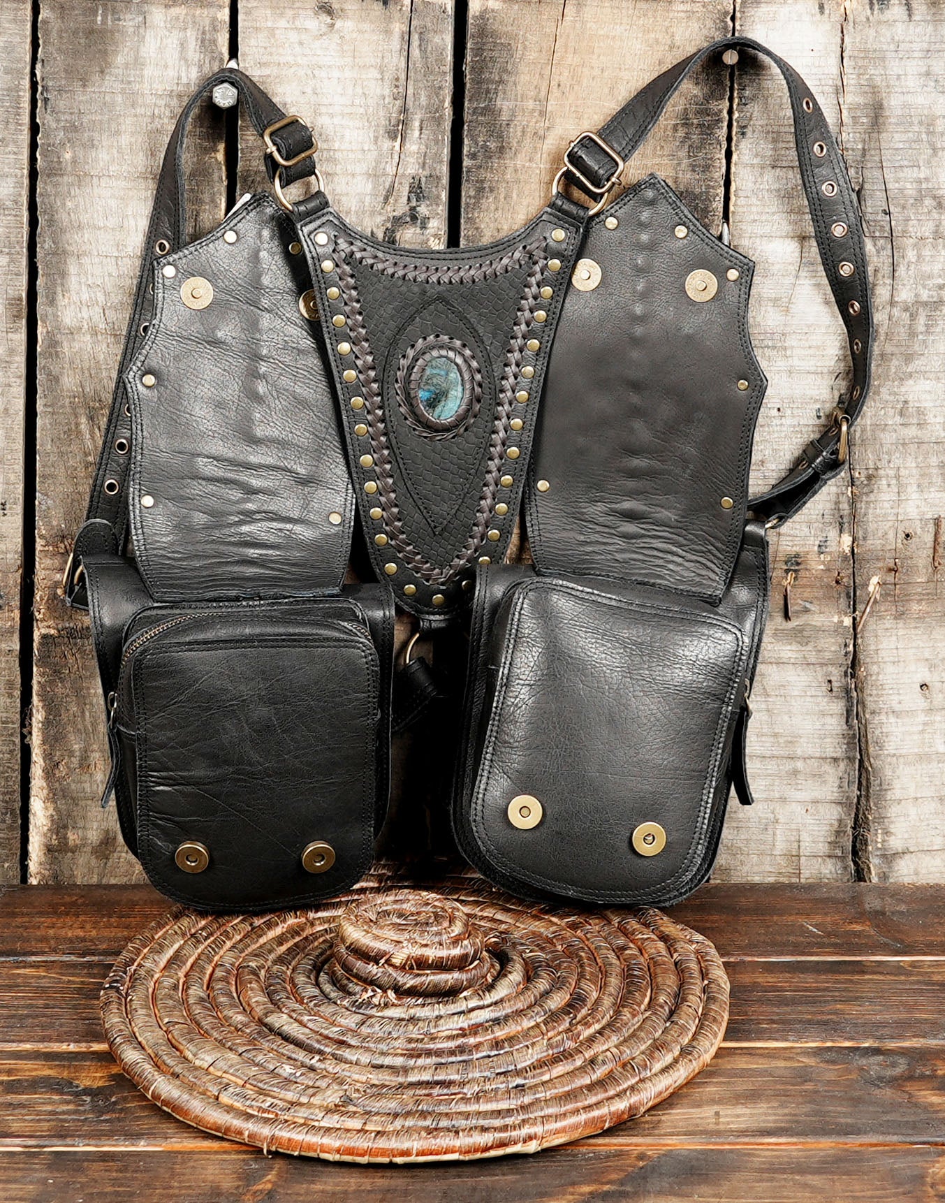 Stylish black leather shoulder holster bag with stud accents