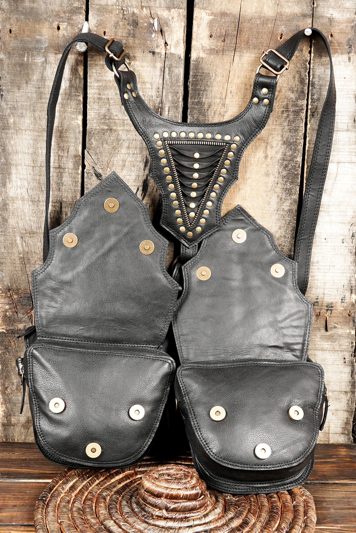 “Festival leather holster with detailed panel design and secure zippers”