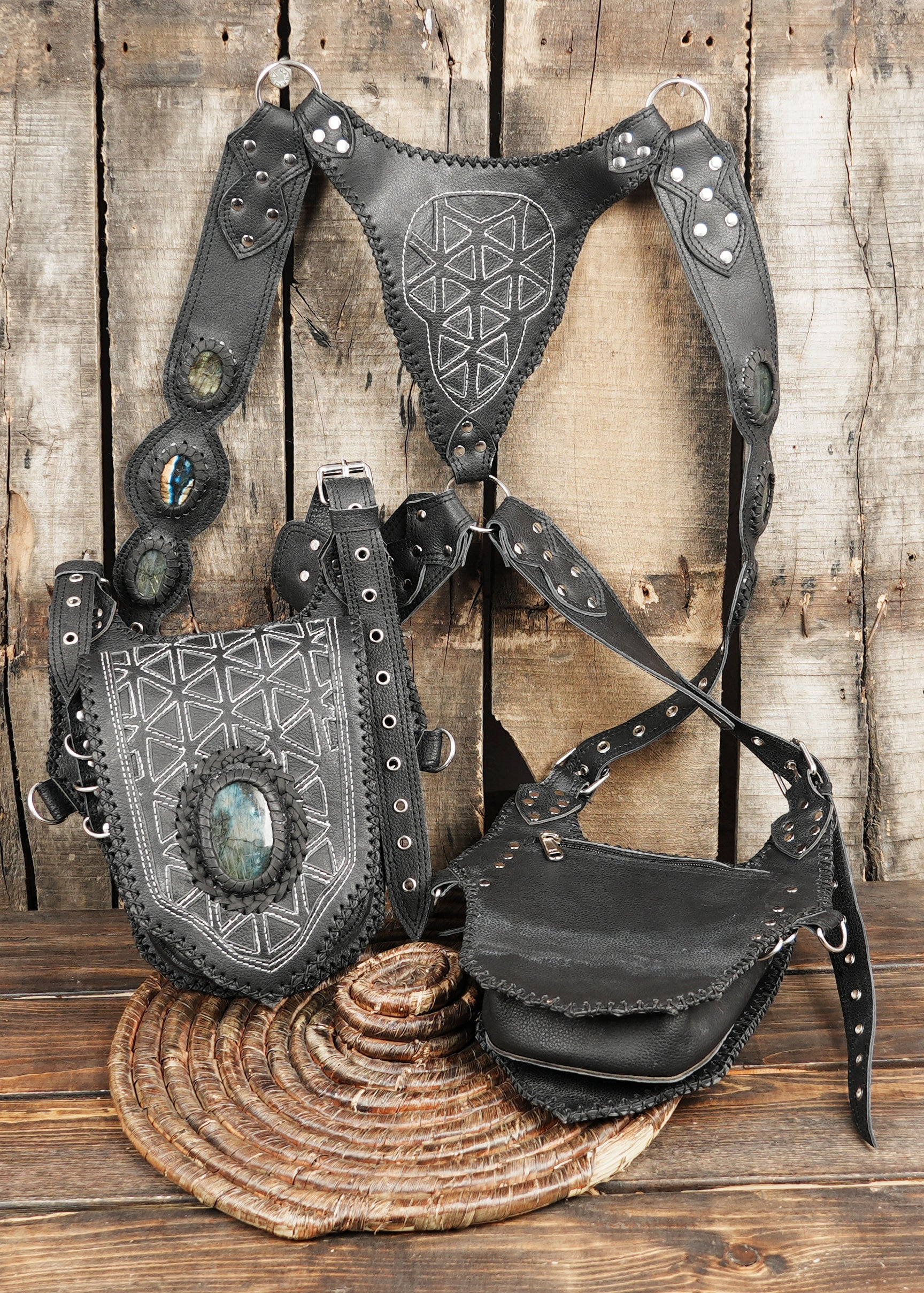 Utility leather shoulder rig with artistic embossed texture and removable pockets