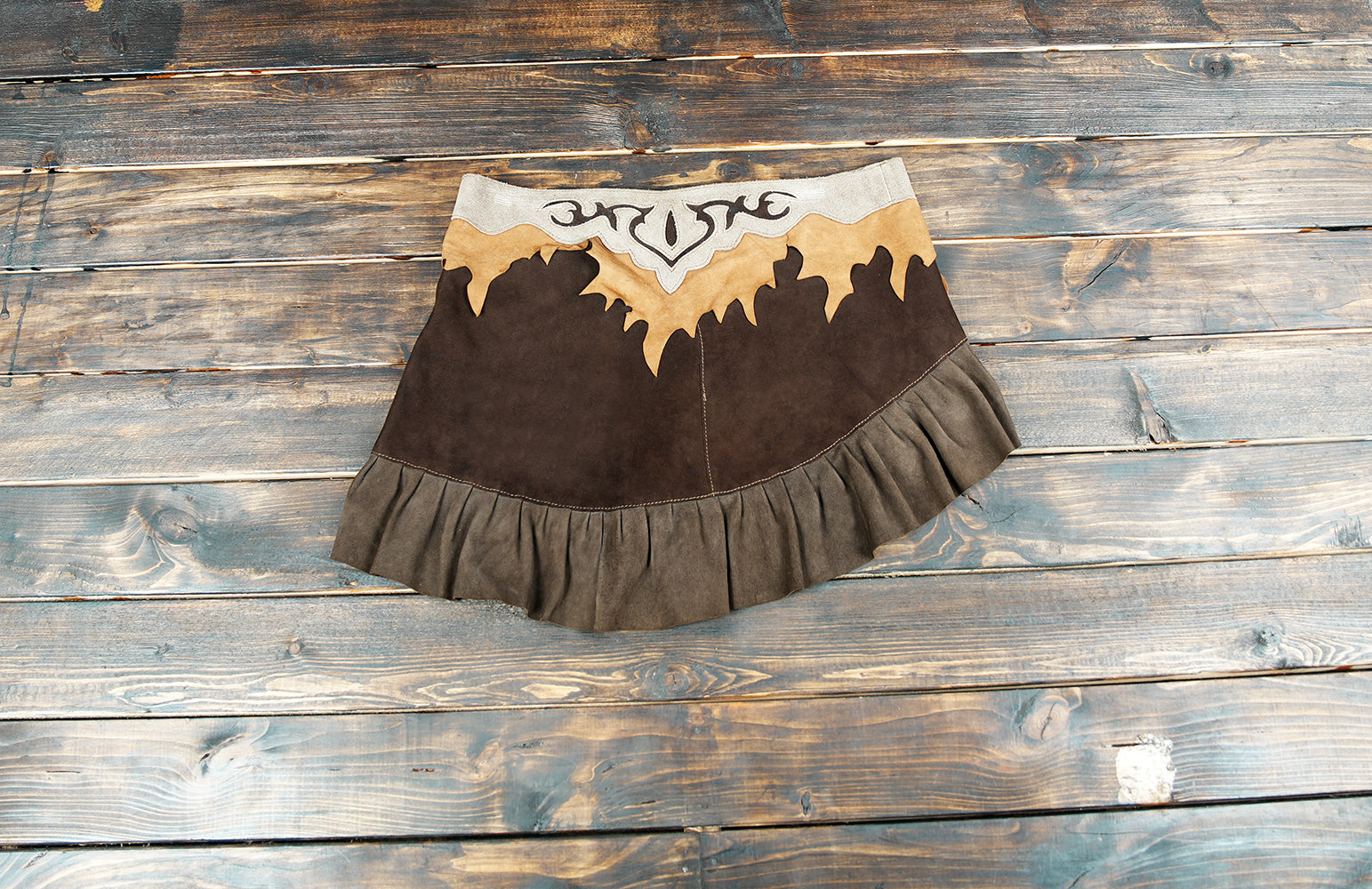 “Bohemian Suede Leather Skirt with Tribal Applique and Rustic Ruffle Hem”