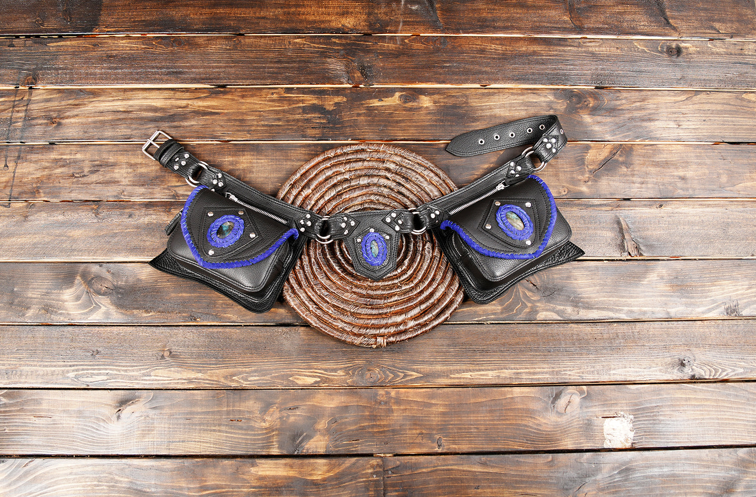 Luxury handcrafted leather belt bag with blue stone and studs