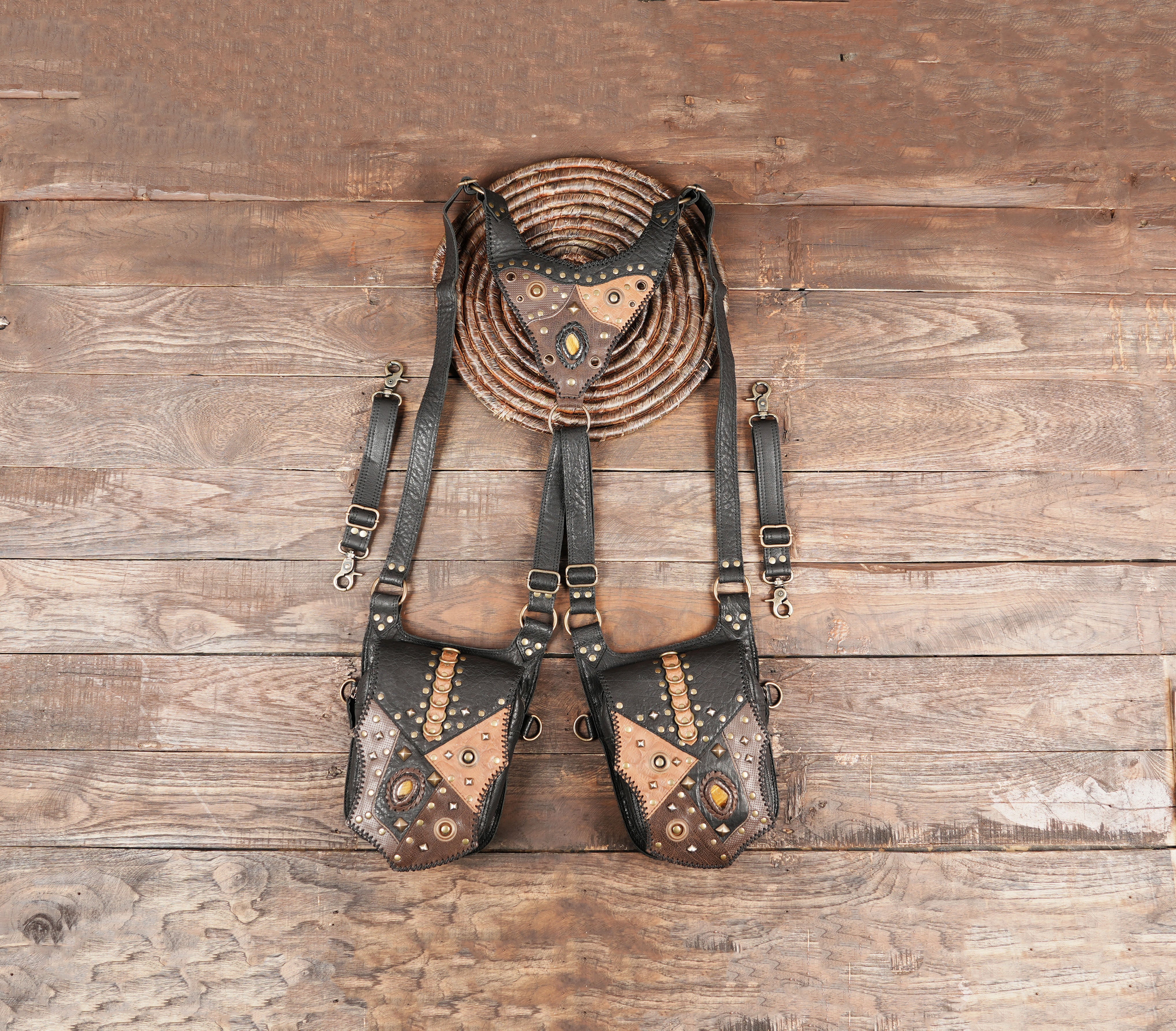 Dual pocket leather shoulder holster with antique studs with gemstone