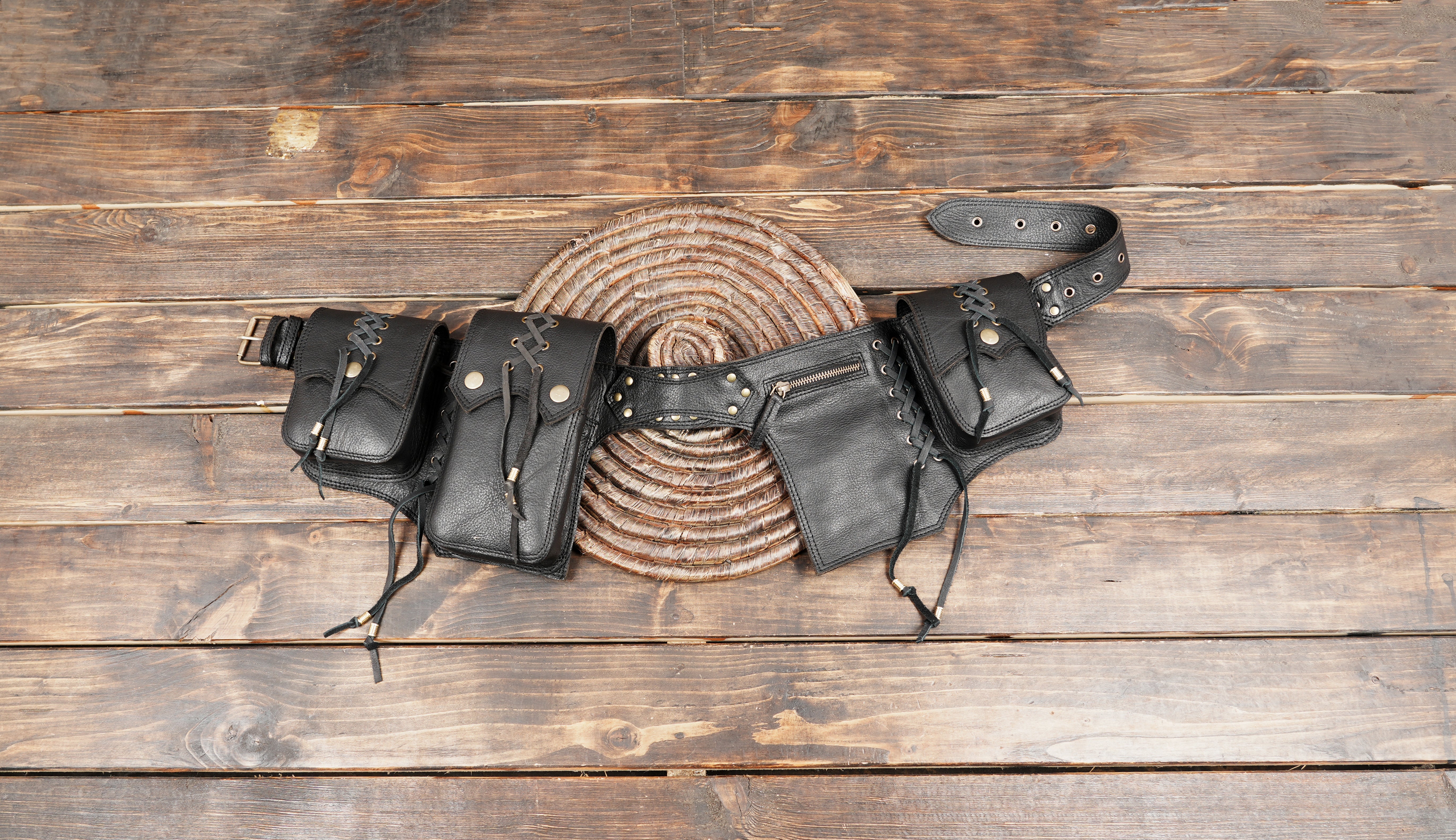 Black leather waist belt with multiple utility pouches