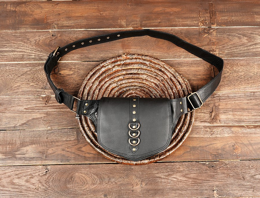 Handmade leather utility belt bag featuring three metal loops and adjustable waist strap.