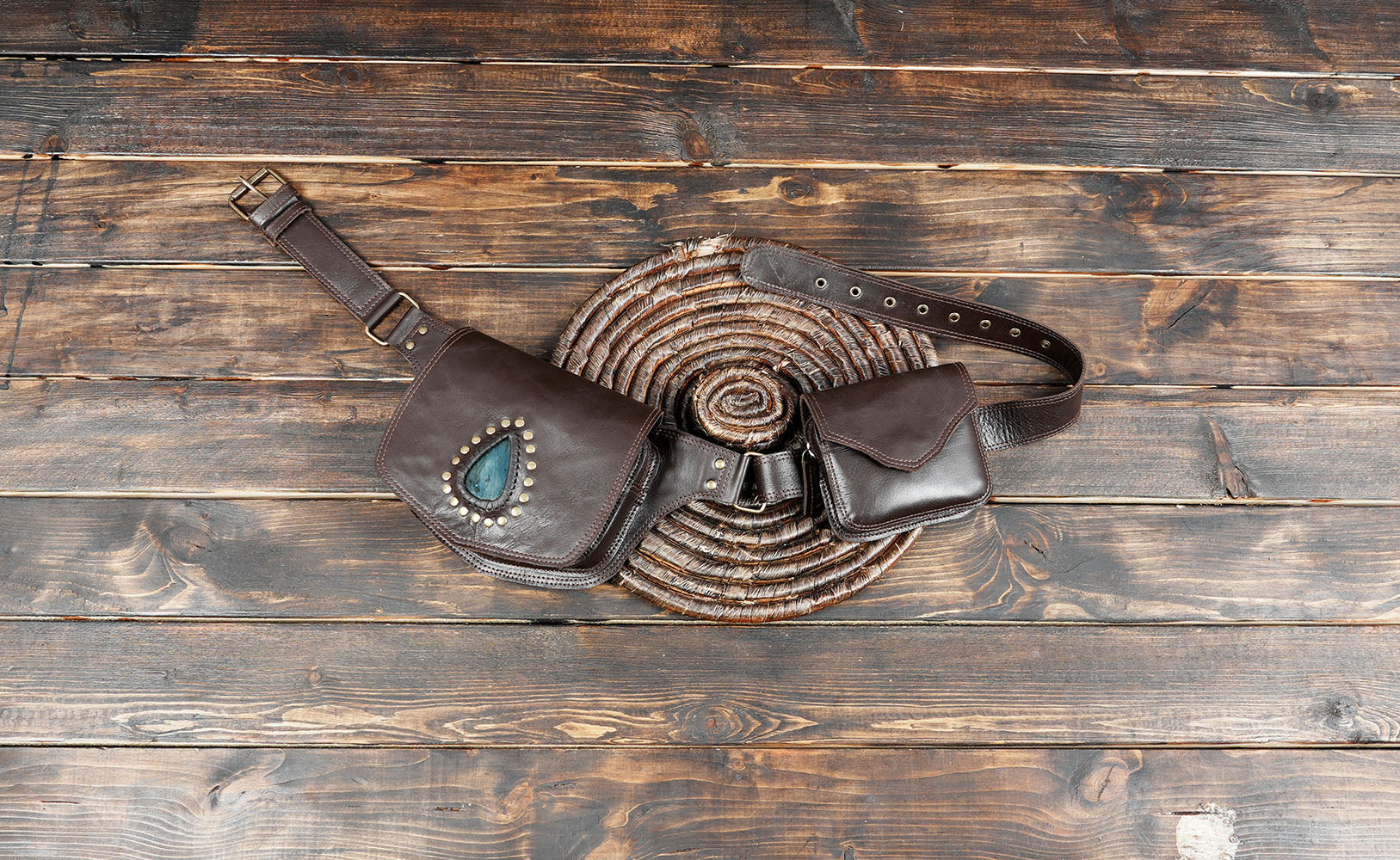 Gothic-inspired leather belt bag with natural stone centerpiece