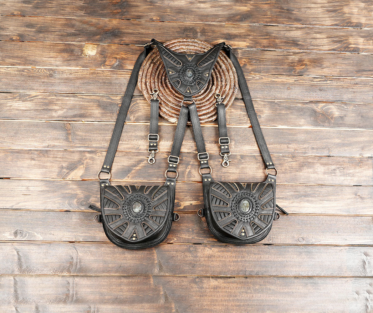 This handmade black leather double pouch holster harness with gemstone centerpiece