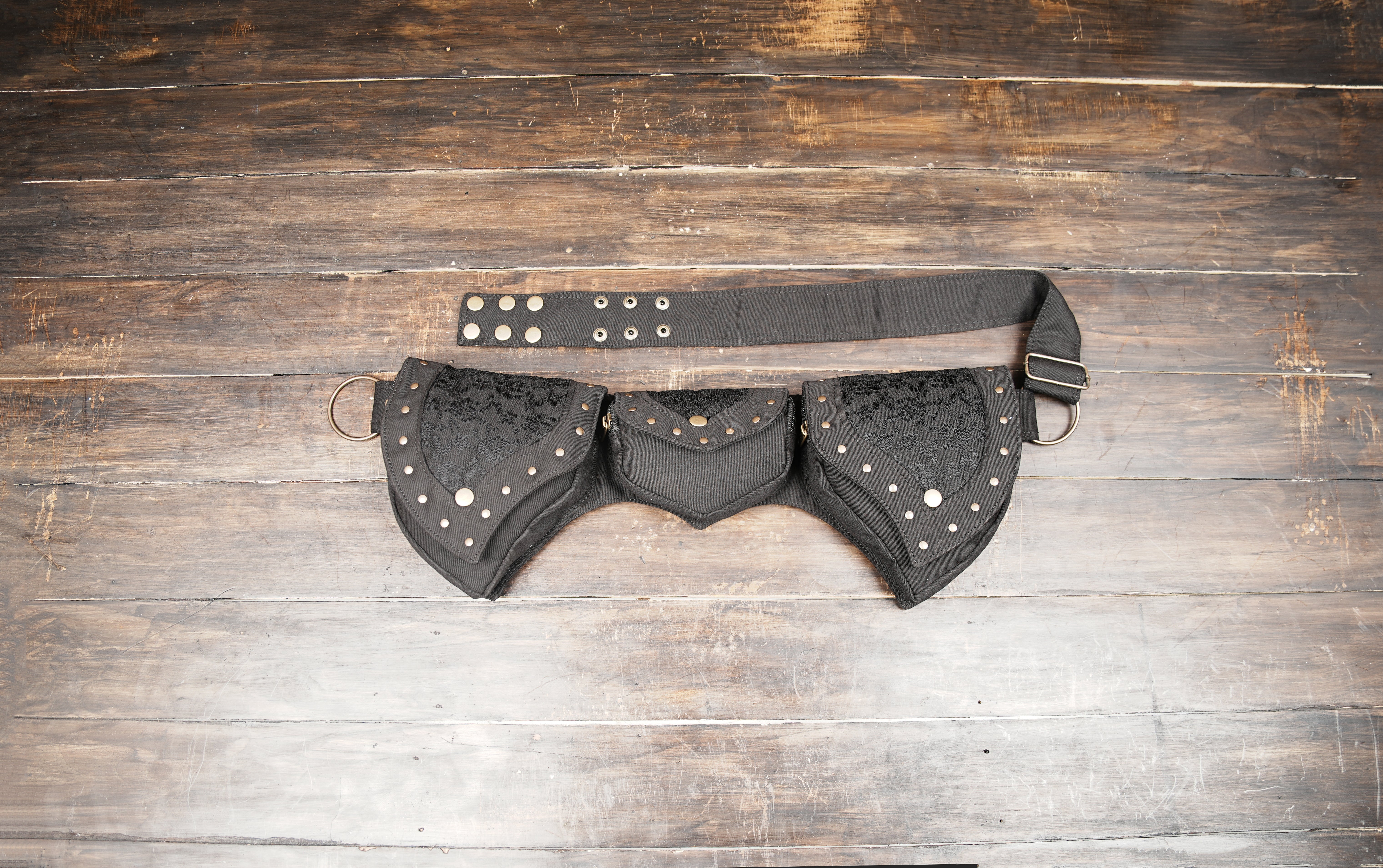 Steampunk-inspired waist pouch with lace design