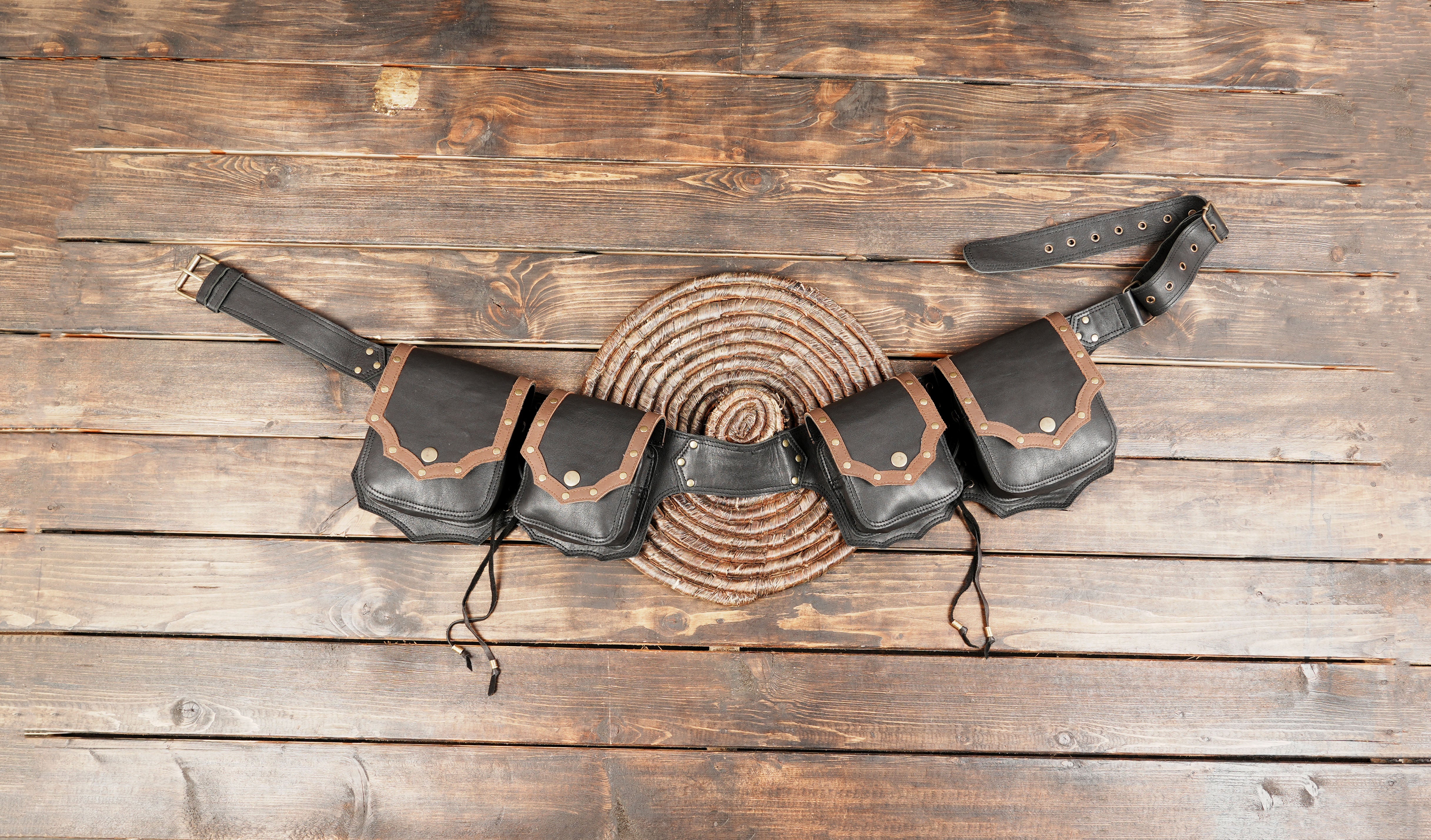 This Handmade Leather Waist Belt with Multiple Pouches is a perfect balance of style and functionality.