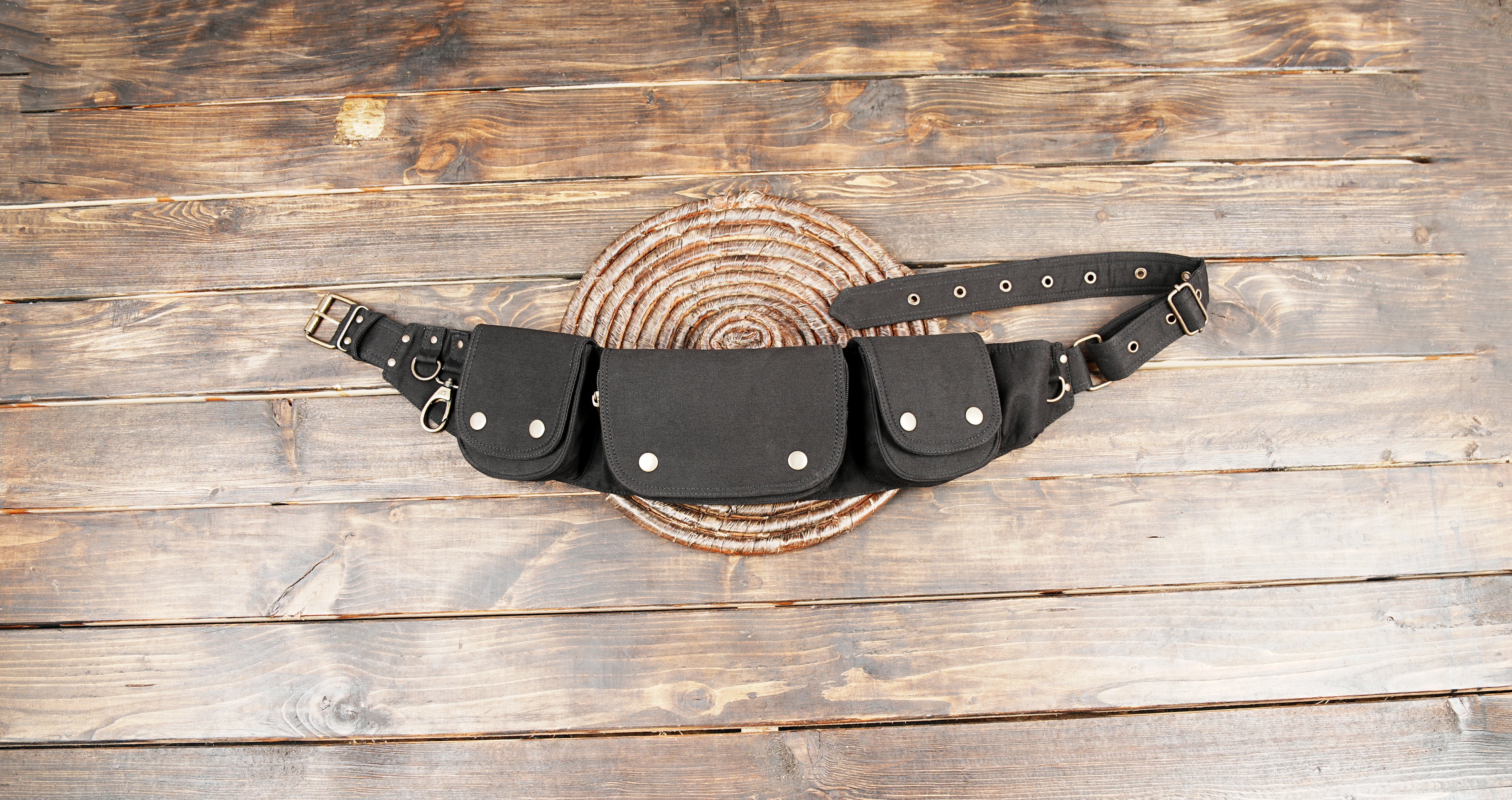 Unisex festival waist bag in black canvas with adjustable strap