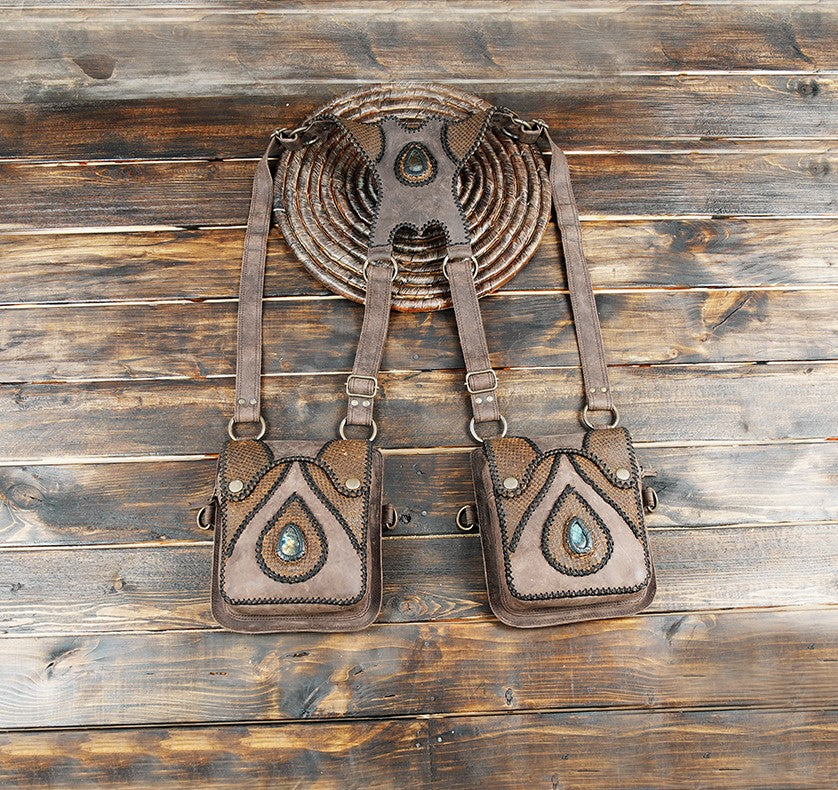 Rustic handmade brown leather holster bag featuring a teardrop gemstone design