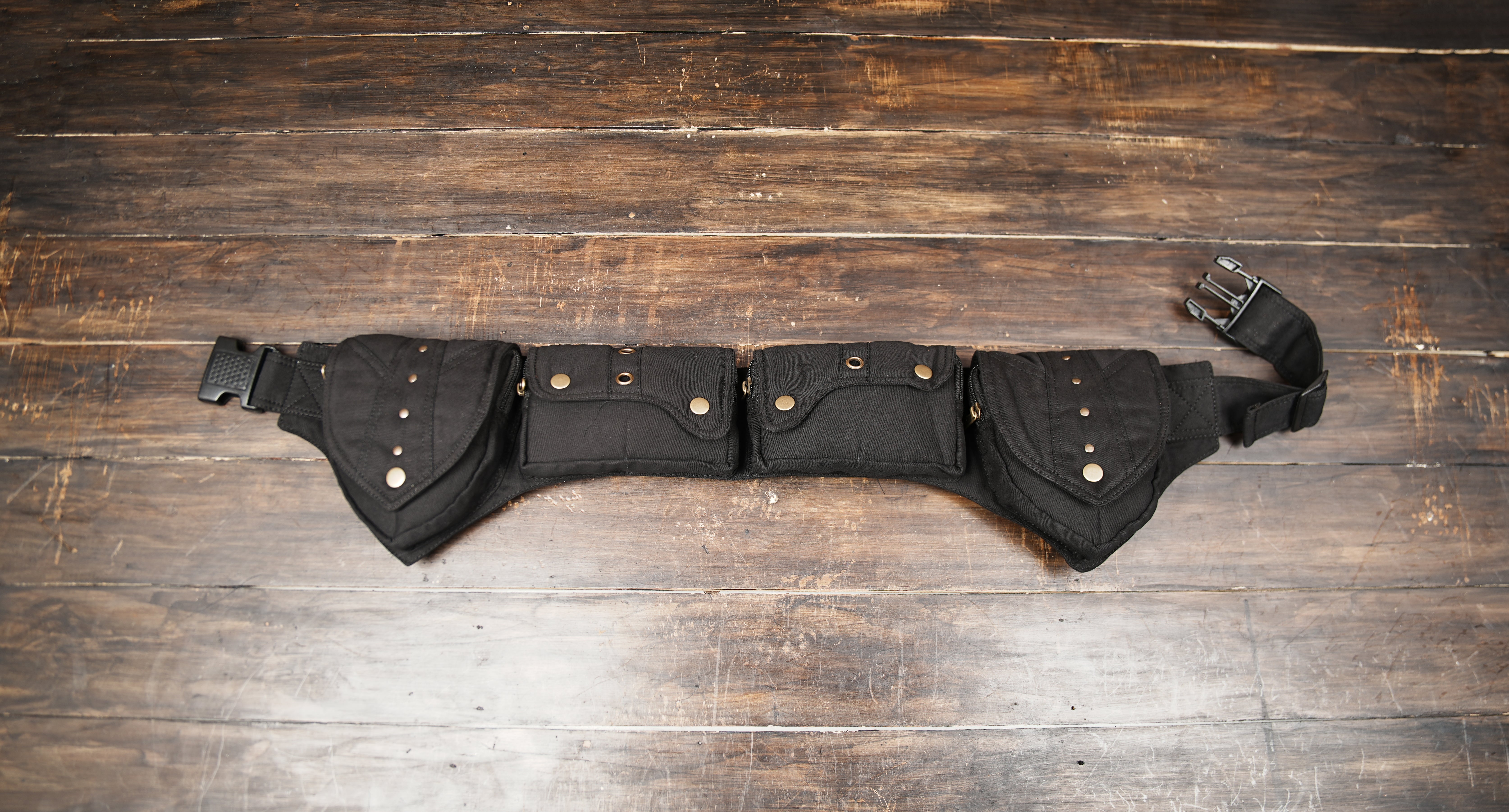 Black utility belt with multiple pockets front view