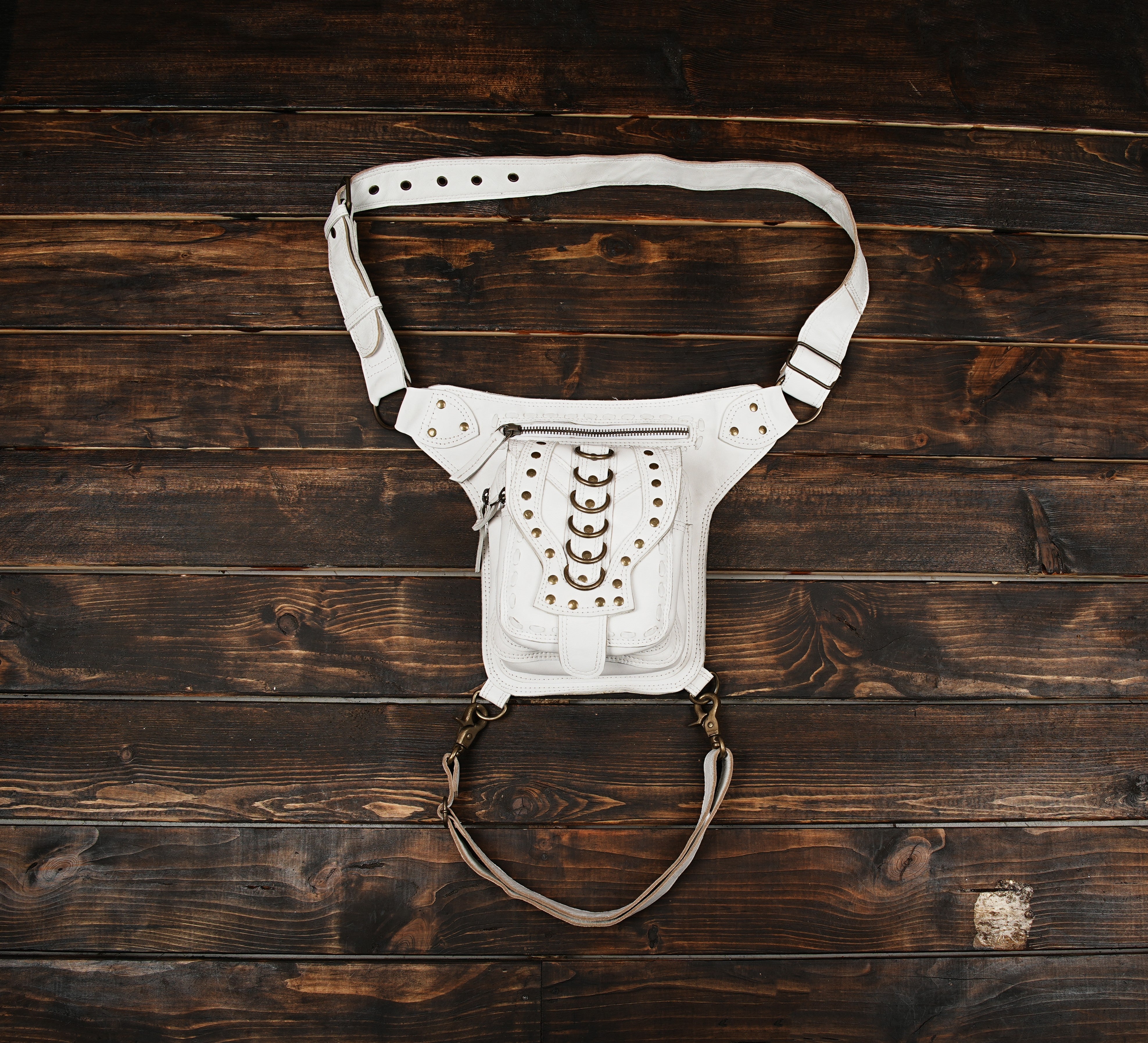 Handmade white leather waist bag with rivet design and belt strap