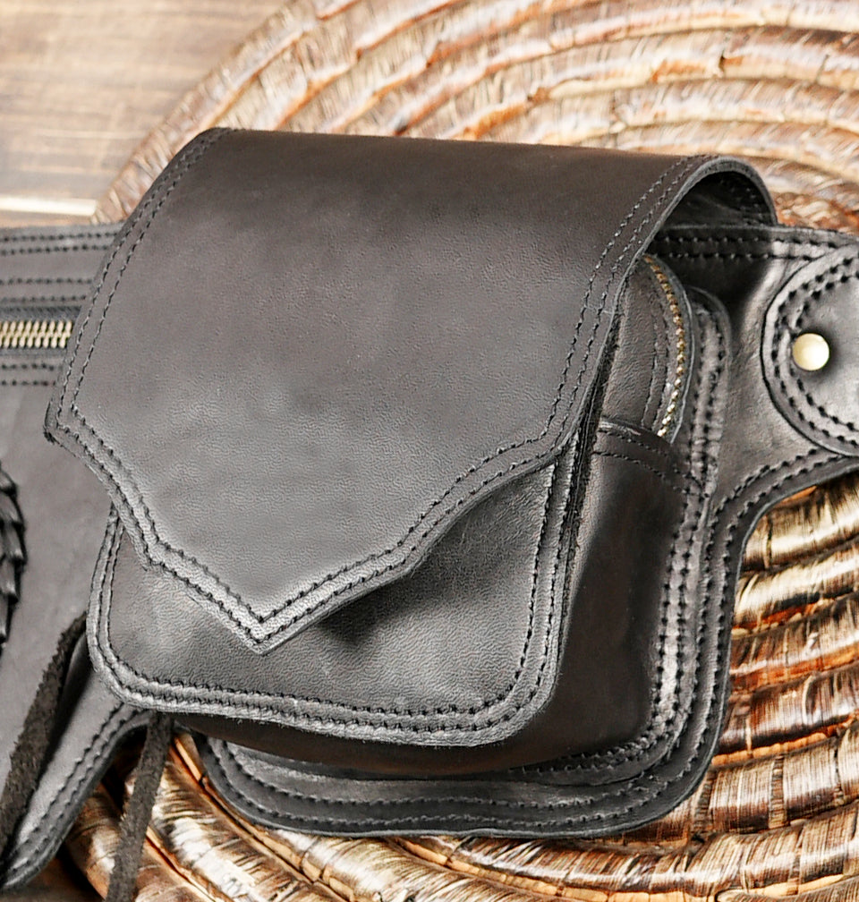 Steampunk-inspired leather belt with gemstone detailing