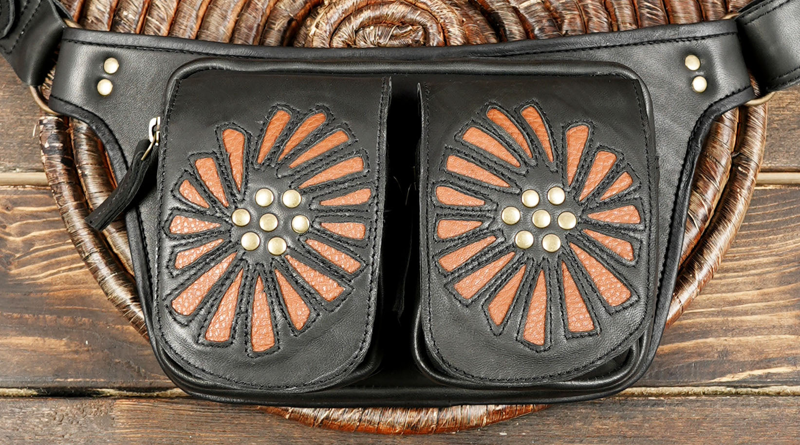 Adjustable black leather hip pouch for travelers