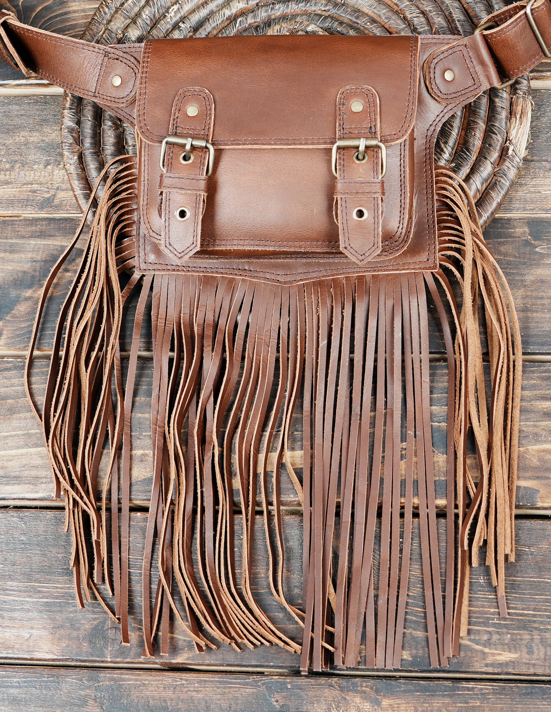 Western inspired brown leather waist bag with adjustable strap