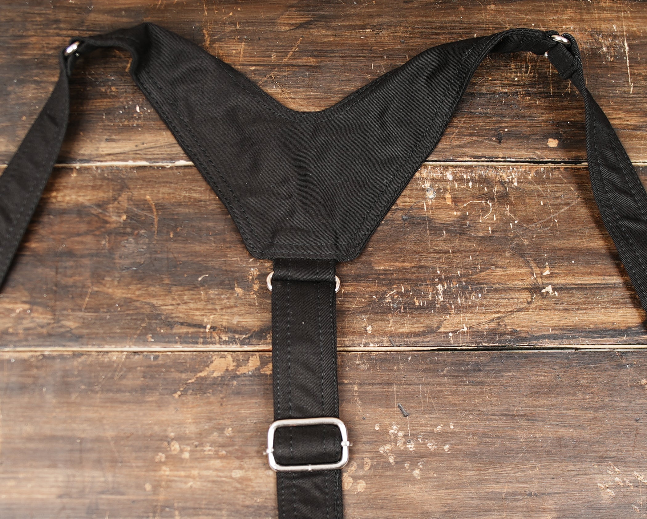 Black cotton holster bag with front zipper storage