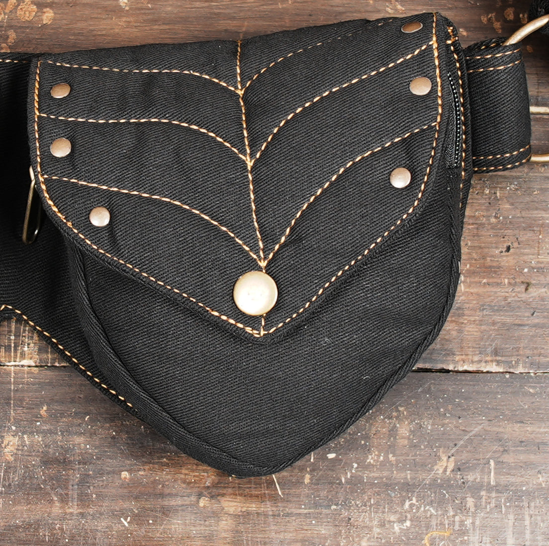 Adjustable canvas belt bag with dual pockets and antique metal details
