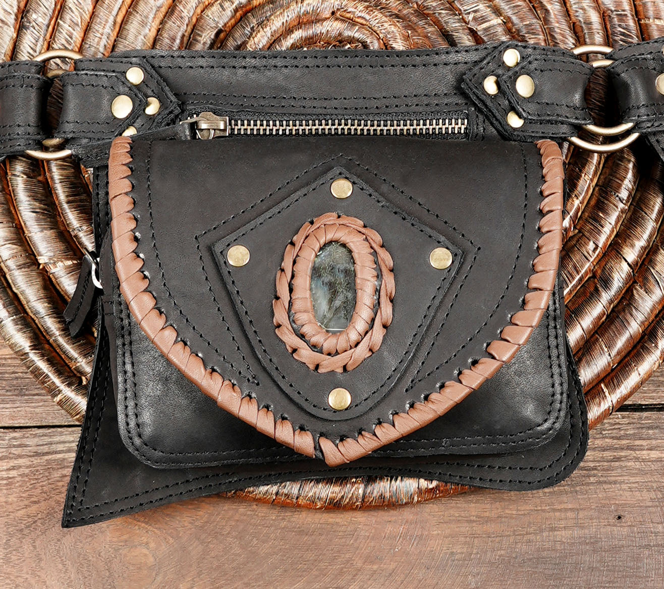 Boho-style leather belt pouch handcrafted with brown and black leather