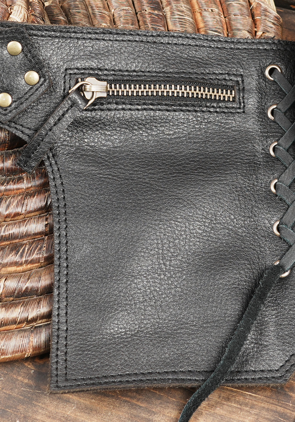 Steampunk style leather waist bag with lacing details