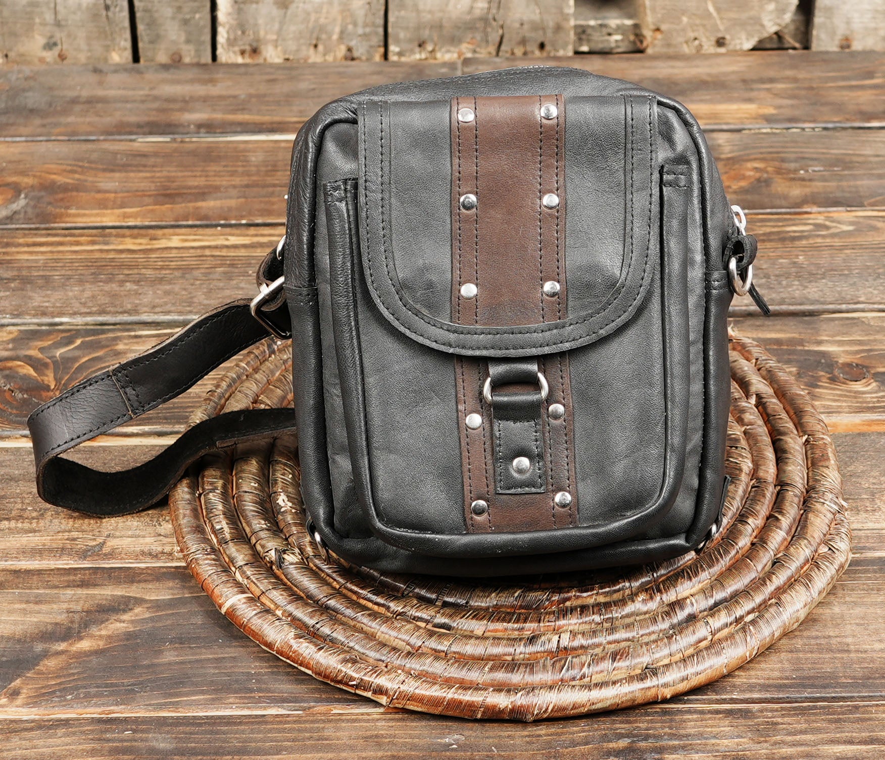 Festival hip bag with rustic rivet design and zipper pocket