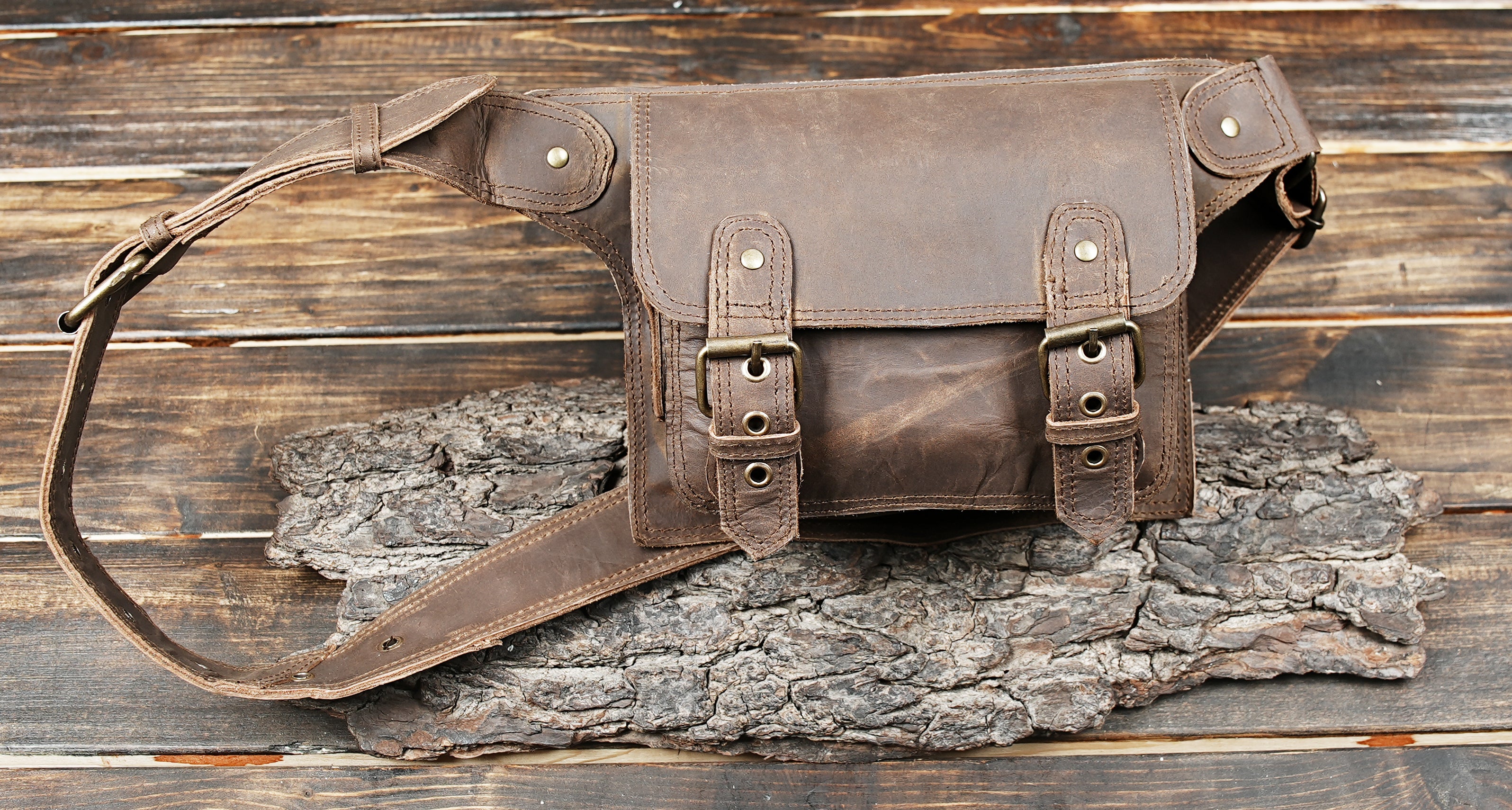 Vintage leather waist pouch with secure compartments