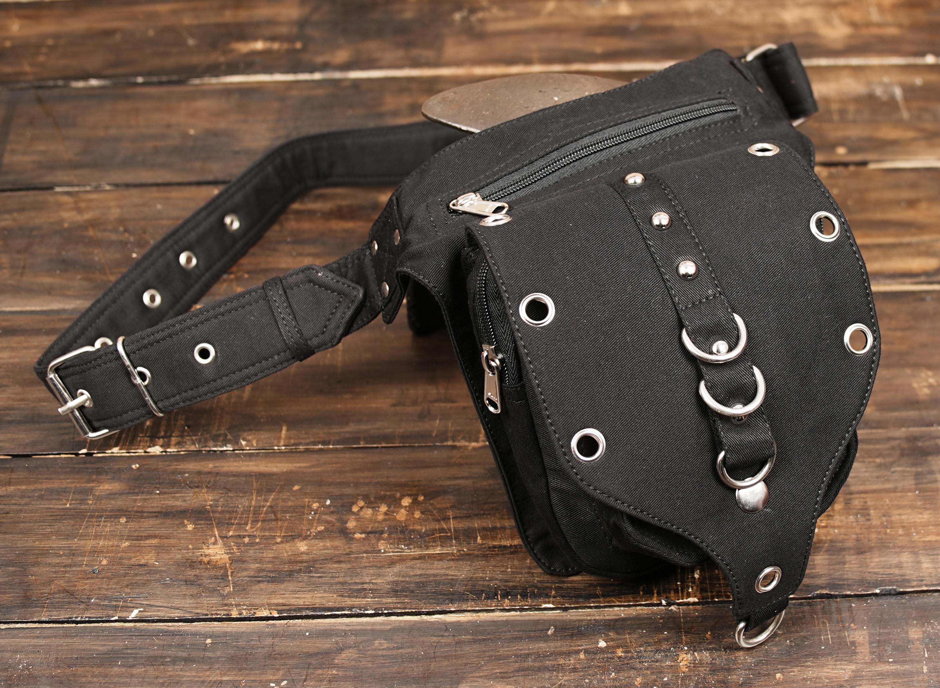 Black cotton hip bag with metal ring embellishments
