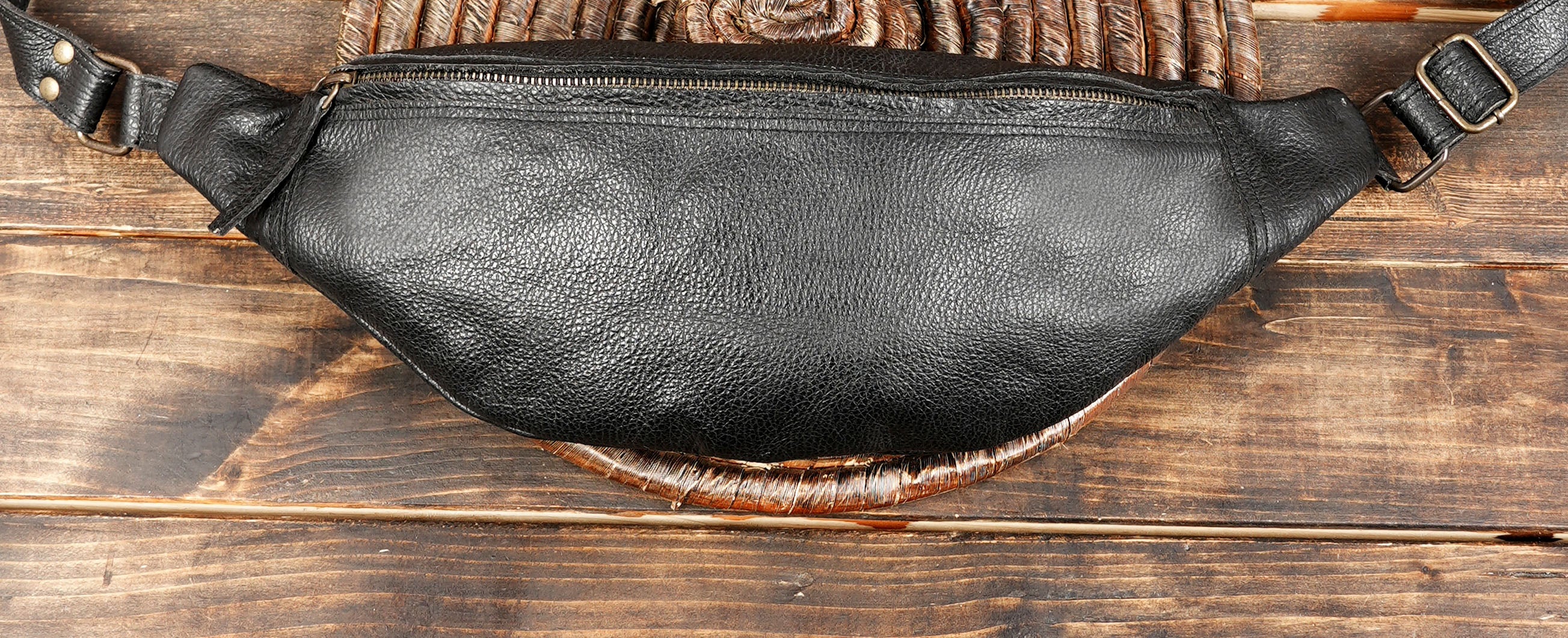 Adjustable leather crossbody waist bag with secure zipper