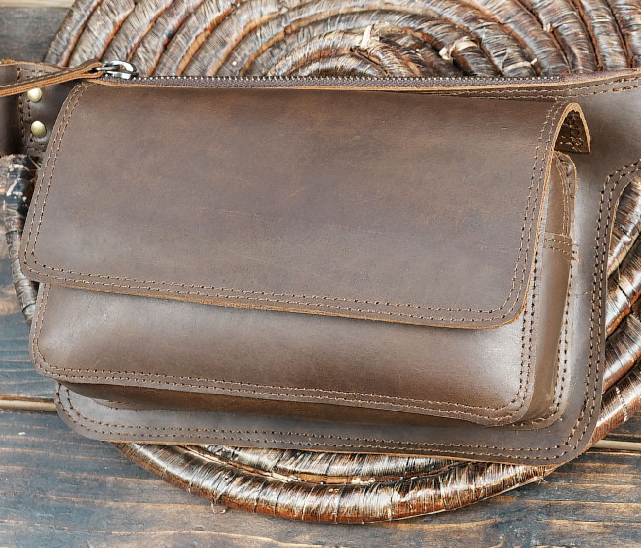 Rugged handmade leather waist bag with adjustable belt