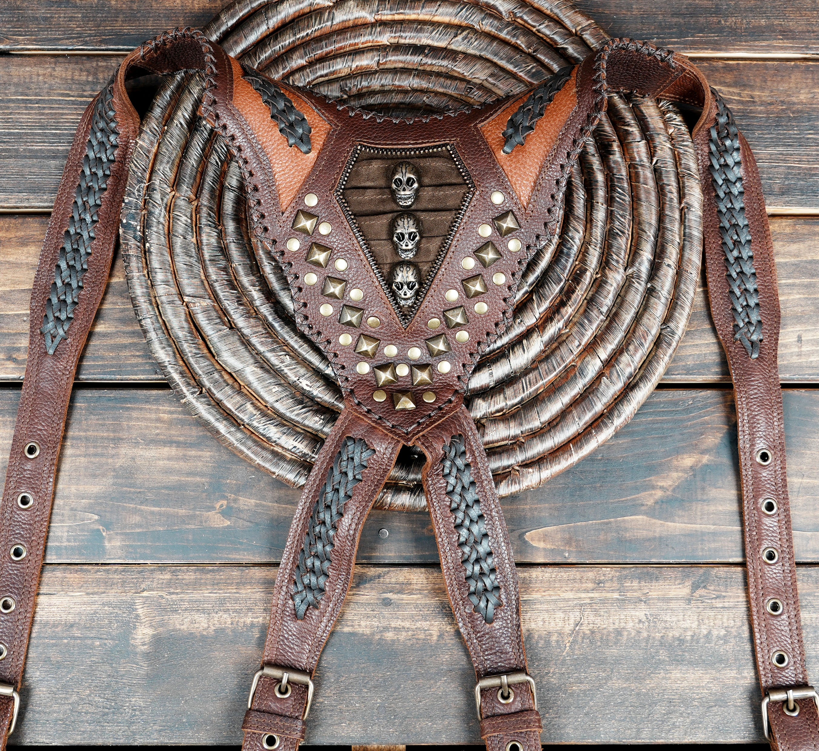 “Artisan leather harness holster with two storage pouches for everyday carry”