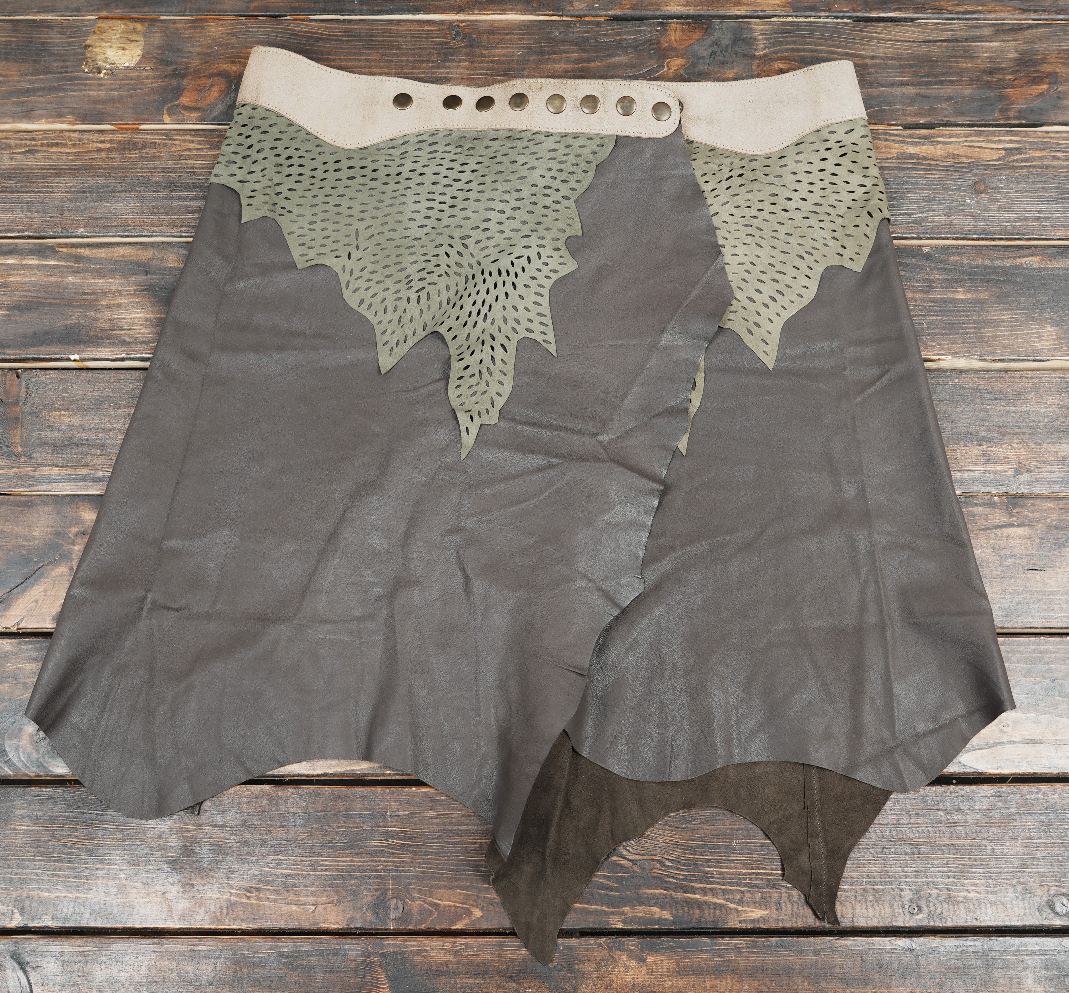 Leather skirt with forest-inspired pattern