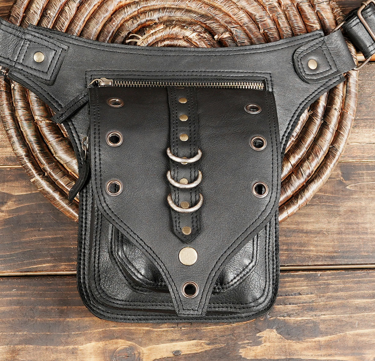 Handmade black leather waist pack with industrial look